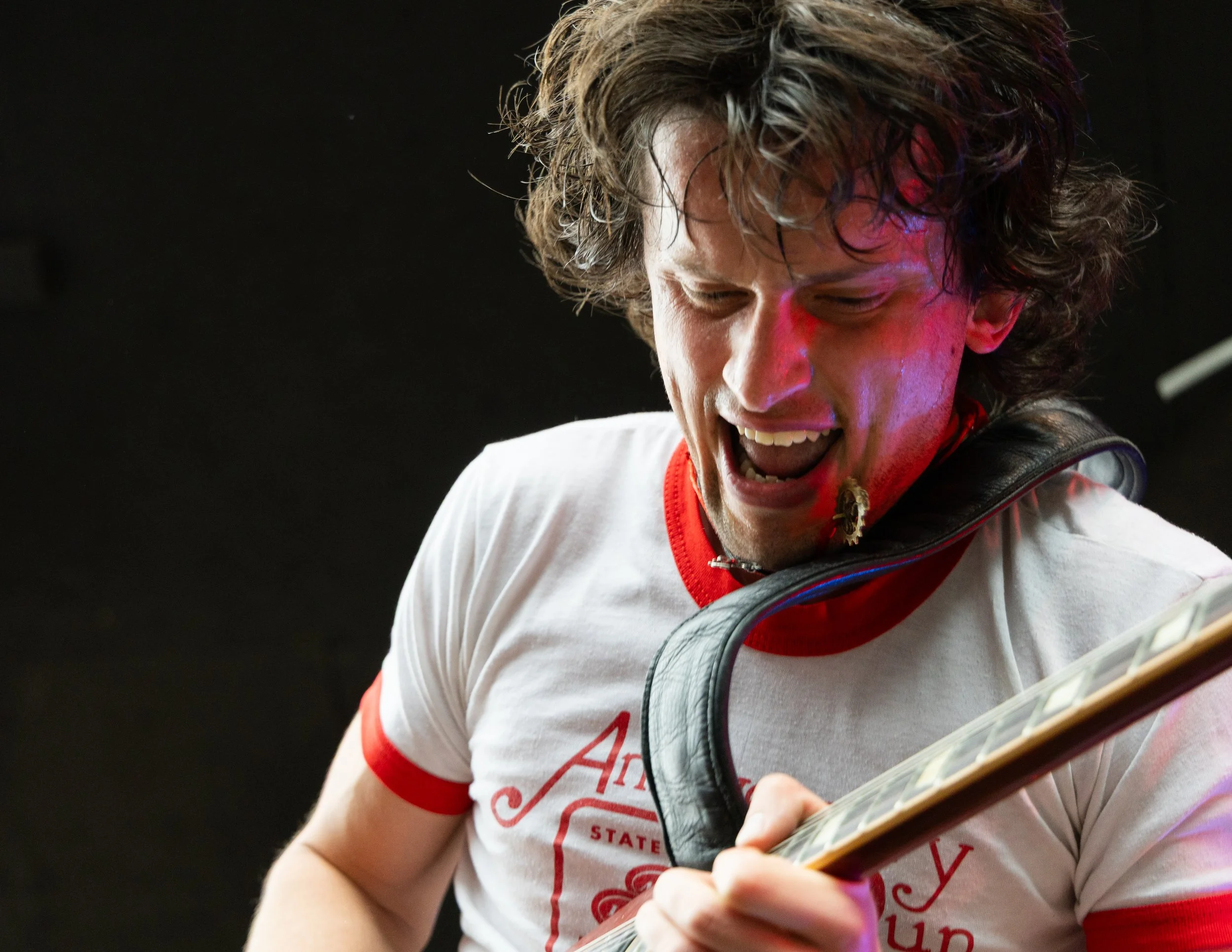  Hamm shreds his guitar as the band performs the outro to “Baby I Know You Well.” 