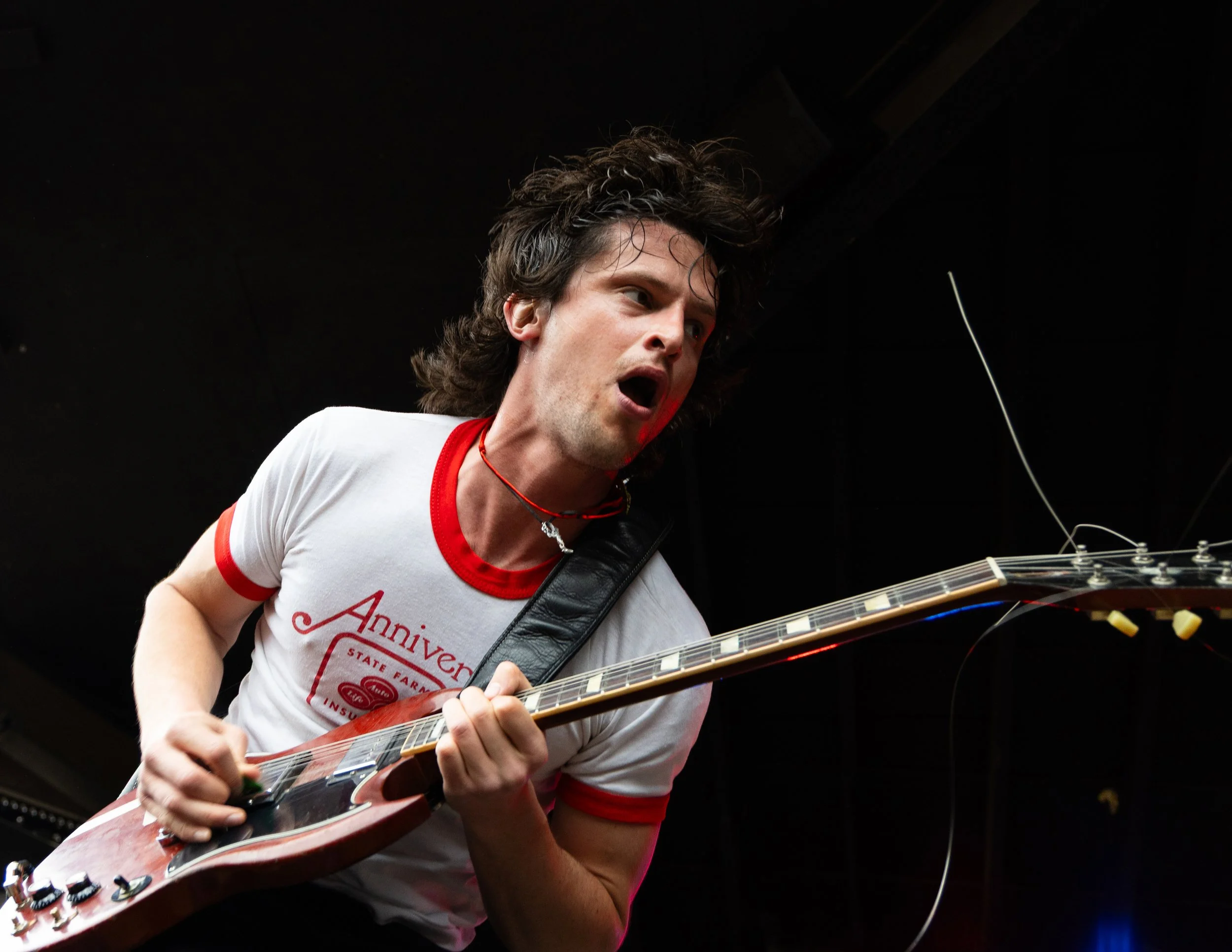  Hamm shreds his guitar as the band performs the outro to “Baby I Know You Well.” 