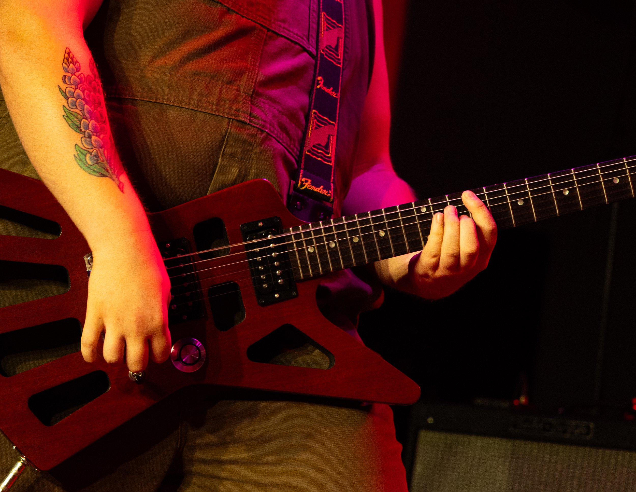  Dillion Aitala, lead guitarist for Grocery Bag, performs the outro to “Alone” from the band’s debut album  Break You . 