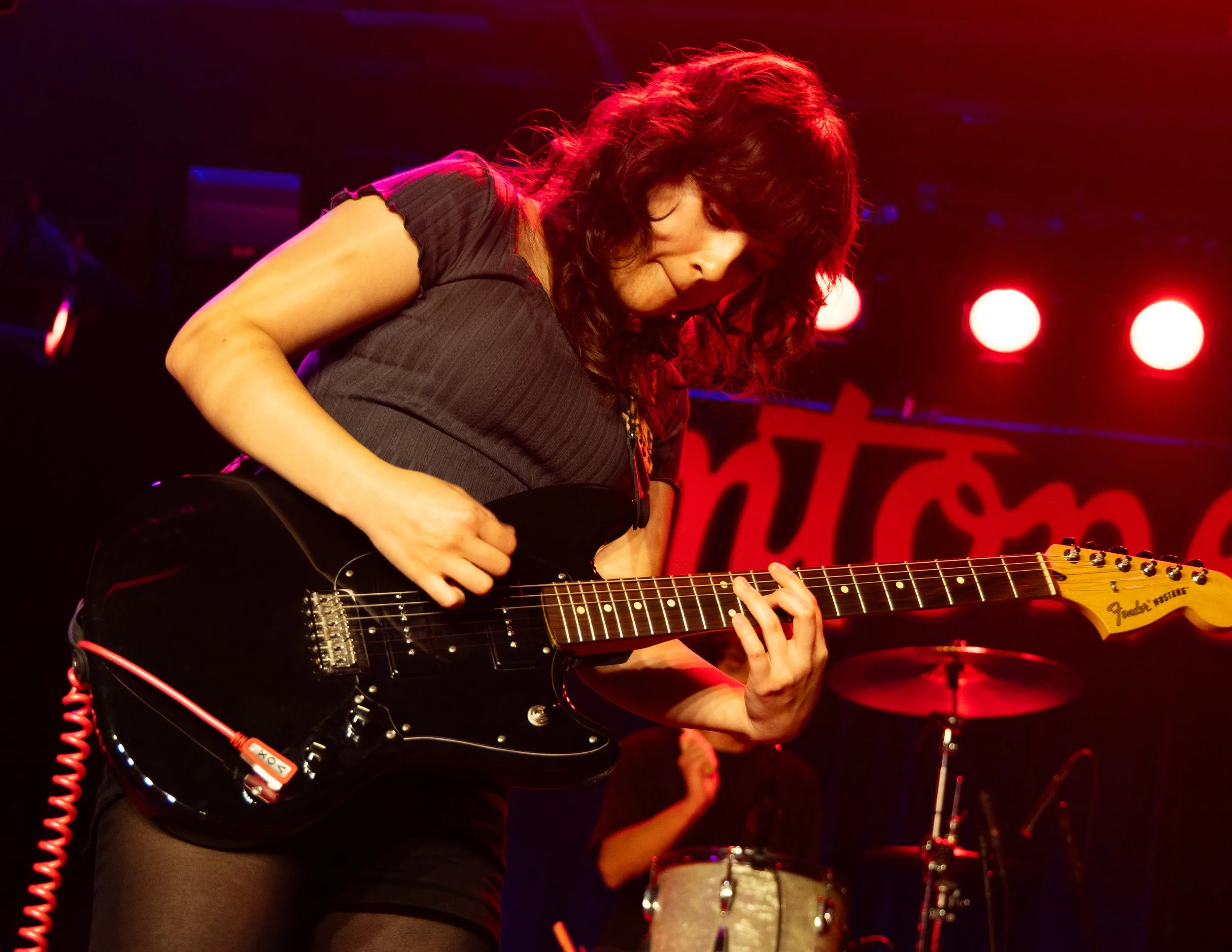  Isabella Martinez, lead vocals and guitarist for Grocery Bag, performs the blunt rock song “Last Draw” from the single  Static Mirage . 