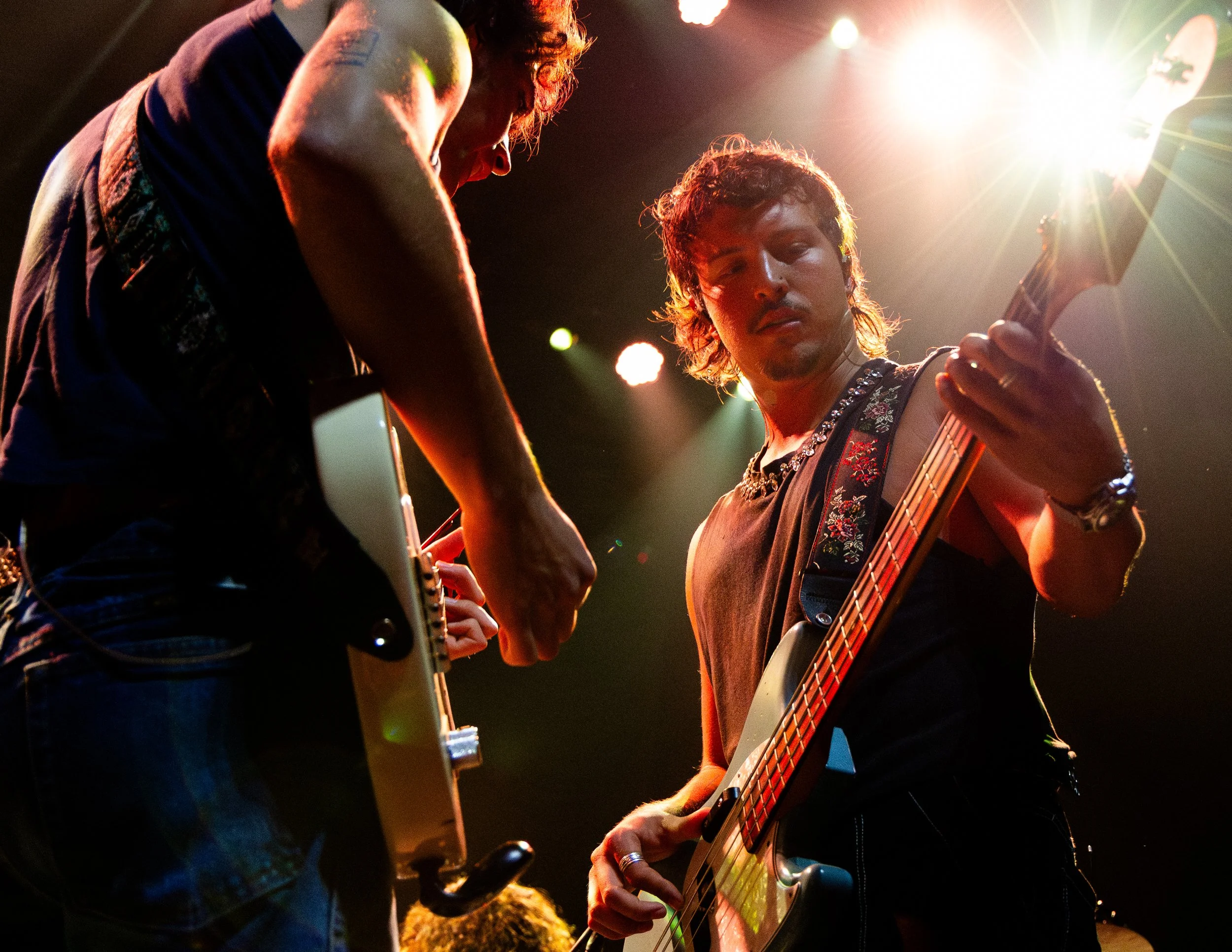  Vocalist and guitarist Trevor Dalrymple walks over to bassist Luca DiVergillo while he plays the instrumental portion of “Snake Charmer.” 