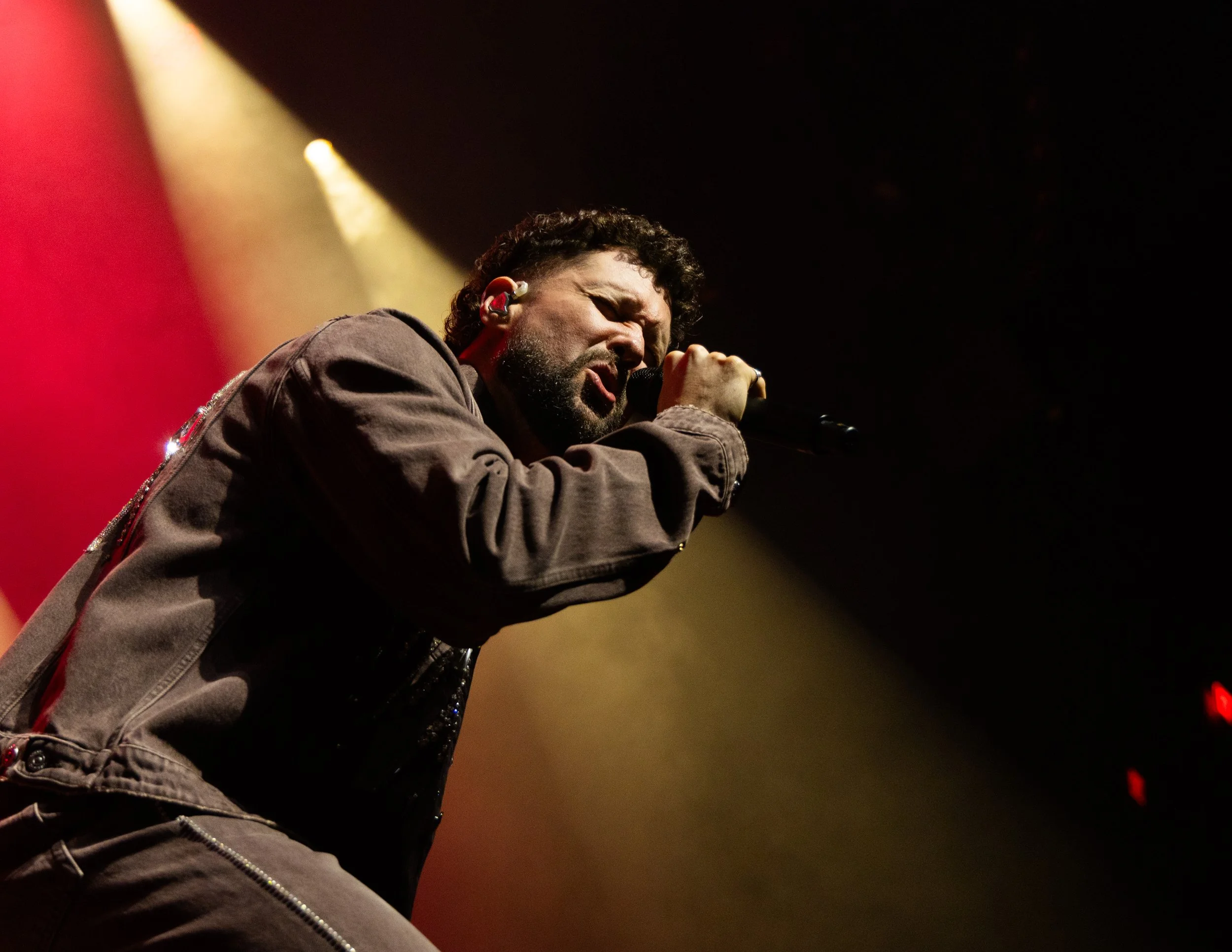  Scott sings the reflective lyrics of “Roots”: “Time flies, oh my days / Only young making dumb mistakes, oh, oh / Get lost in a drunken haze / Got lost, but I’m on my way home.” 