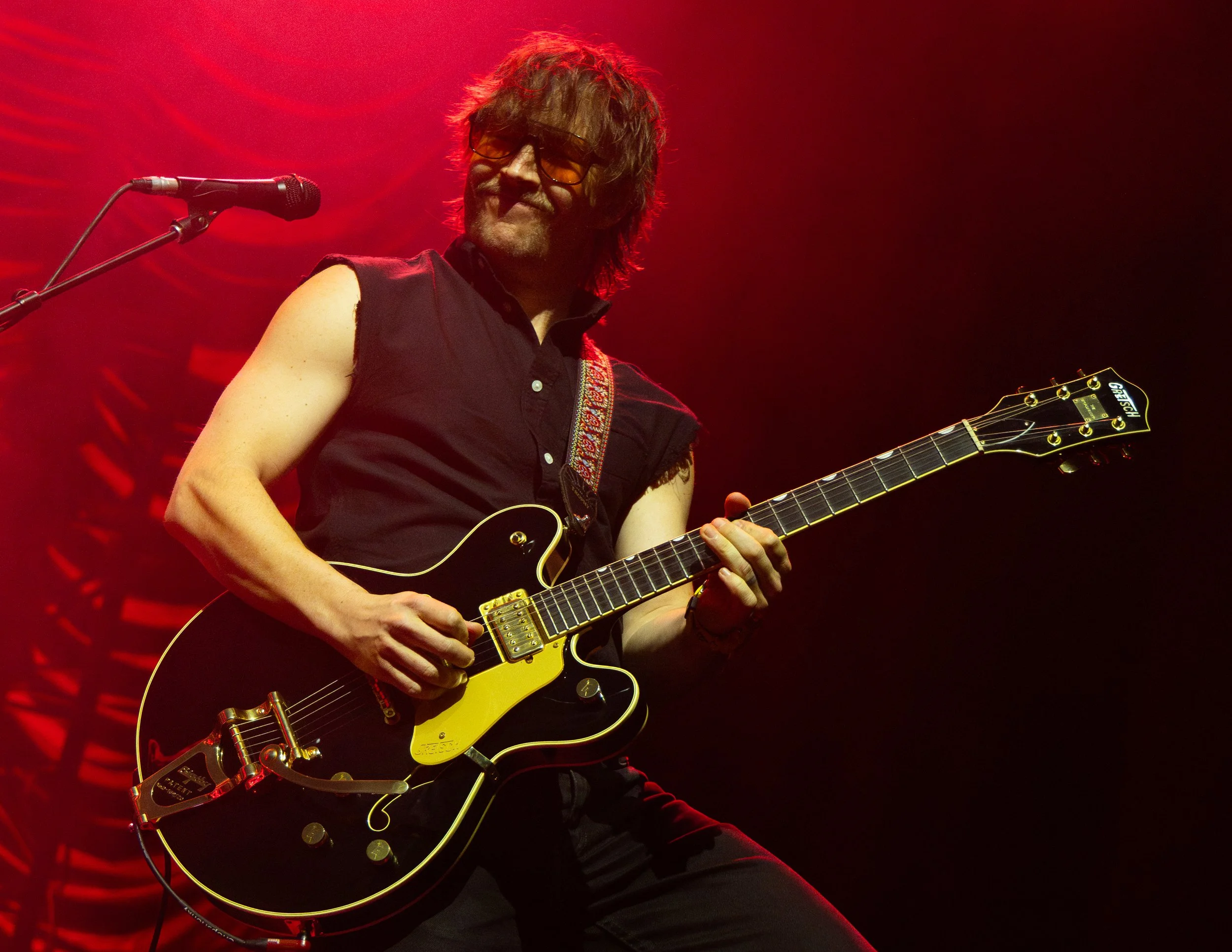  Mitch Parks jams out while playing the chords to “Roots.” 