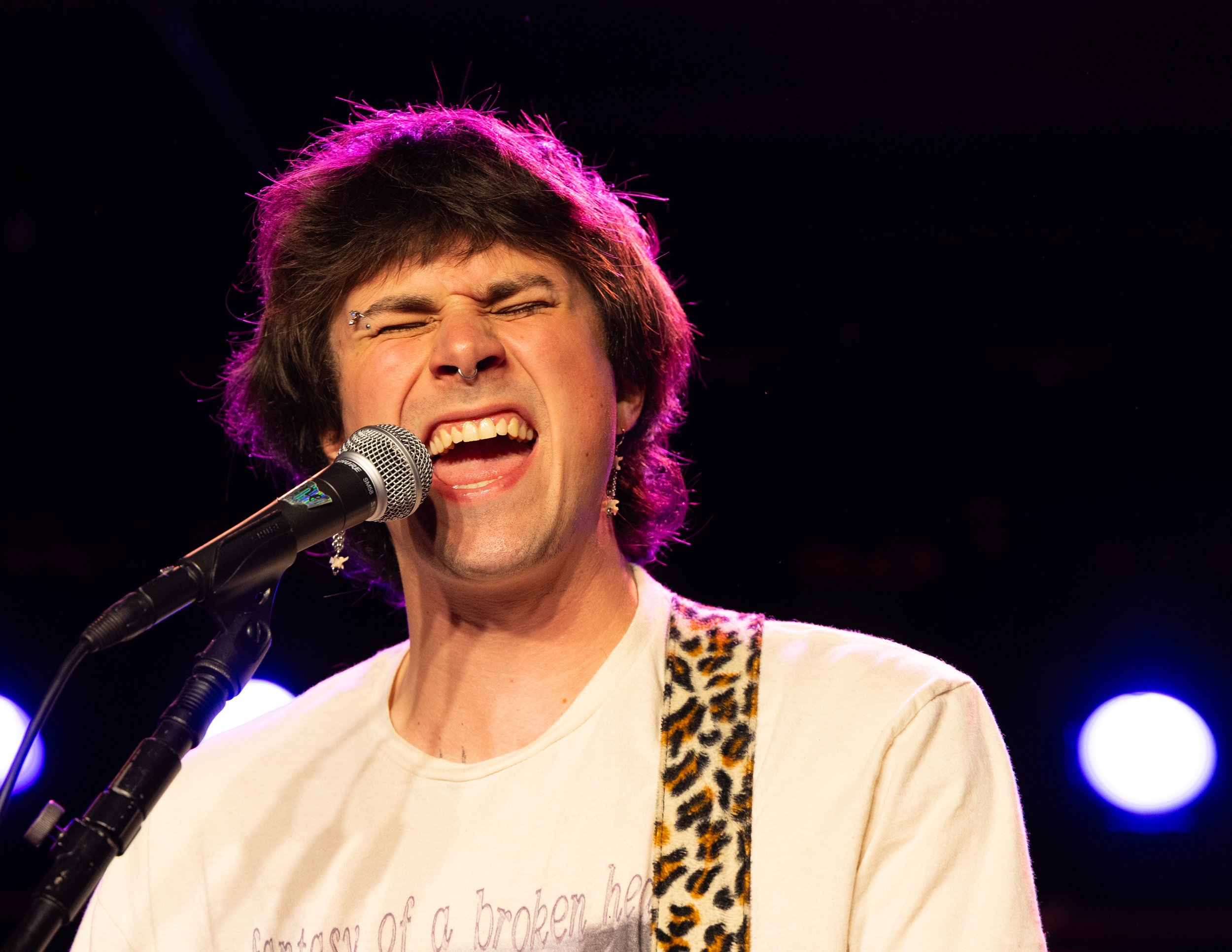  Vocalist Caelan Burris passionately sings “Hell Tribune.” 