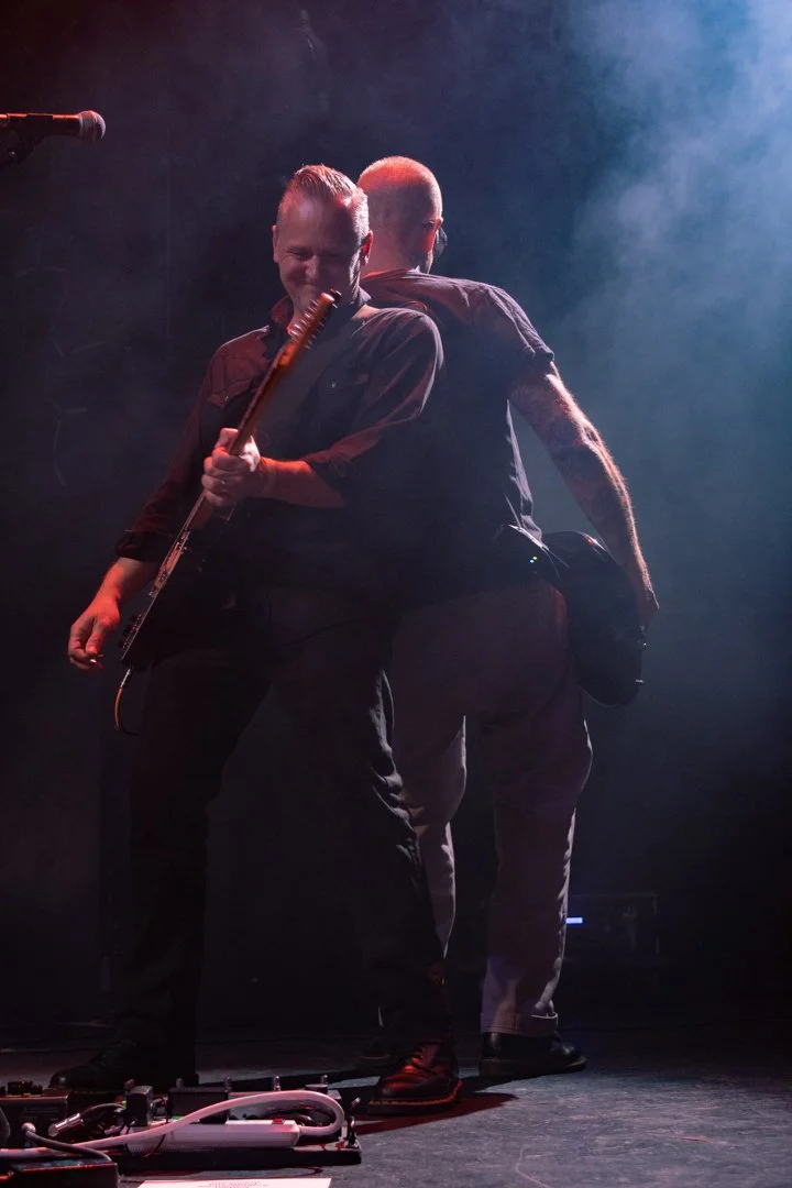  Collins and Siebels rock out back to back to the instrumental heavy rock guitar section of “Open Road Song.” 