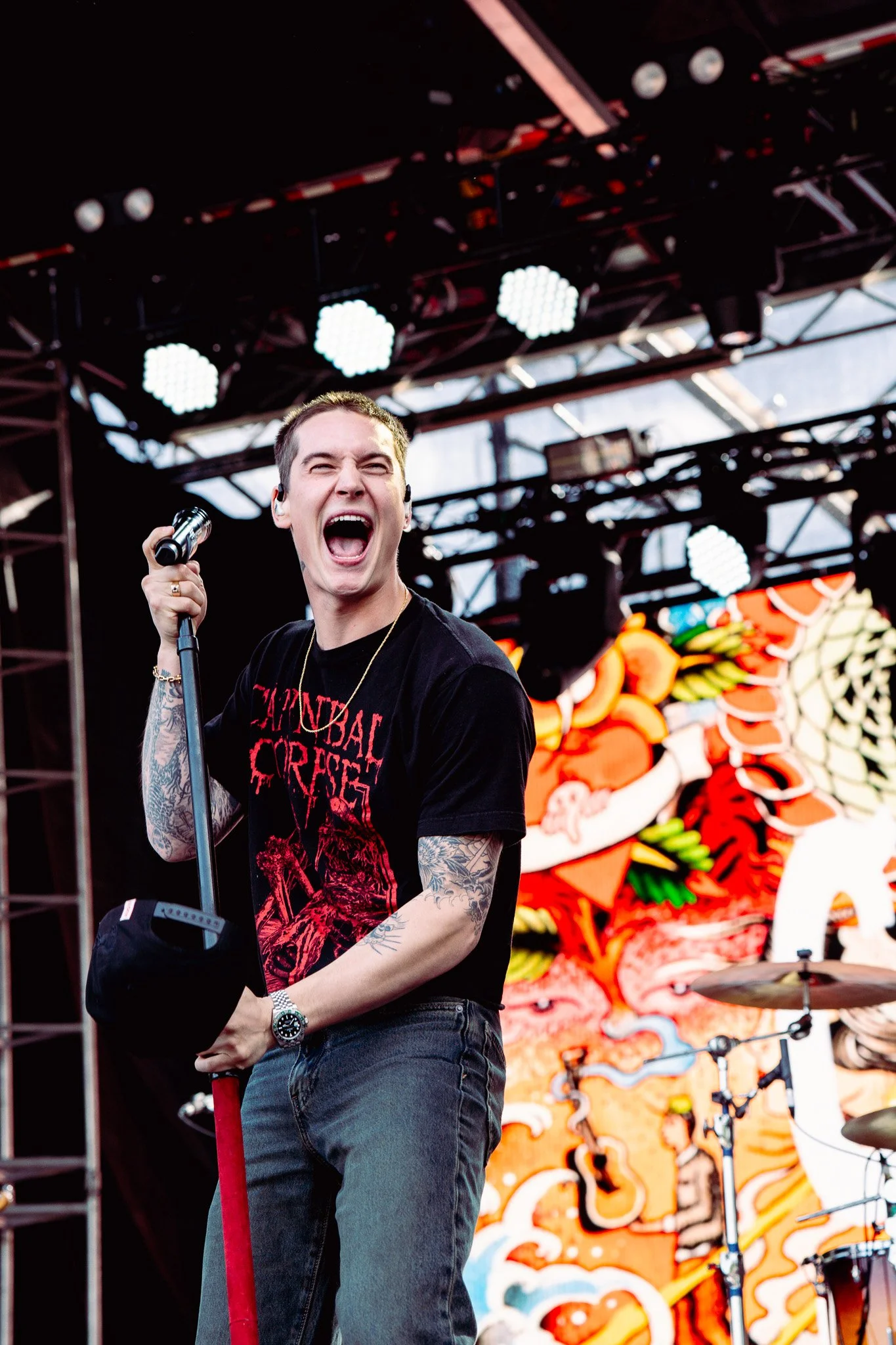  Cameron Whitcomb electrifies the stage with an energetic performance and smiles to the crowd. 