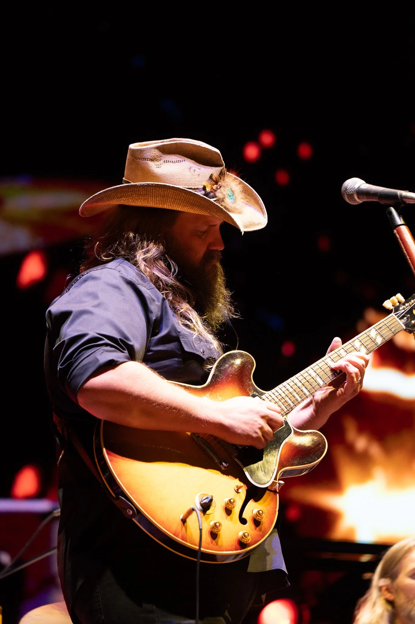  Chris Stapleton headlines the Big River stage and a crowd of thousands. He opens with “Bad As I Used To Be” and mentions his gratitude to fans. 