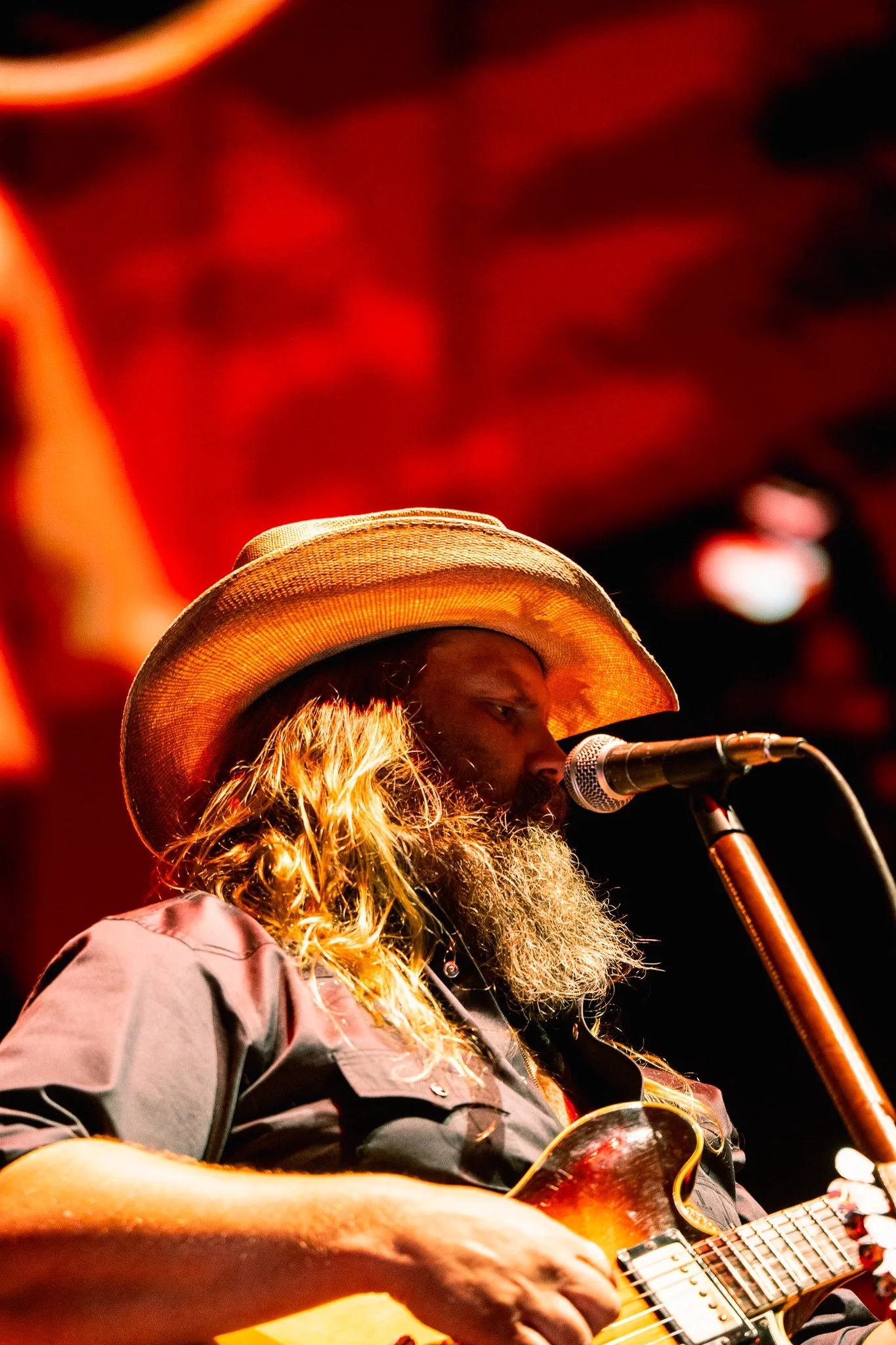  Chris Stapleton headlines the Big River stage and a crowd of thousands. He opens with “Bad As I Used To Be” and mentions his gratitude to fans. 