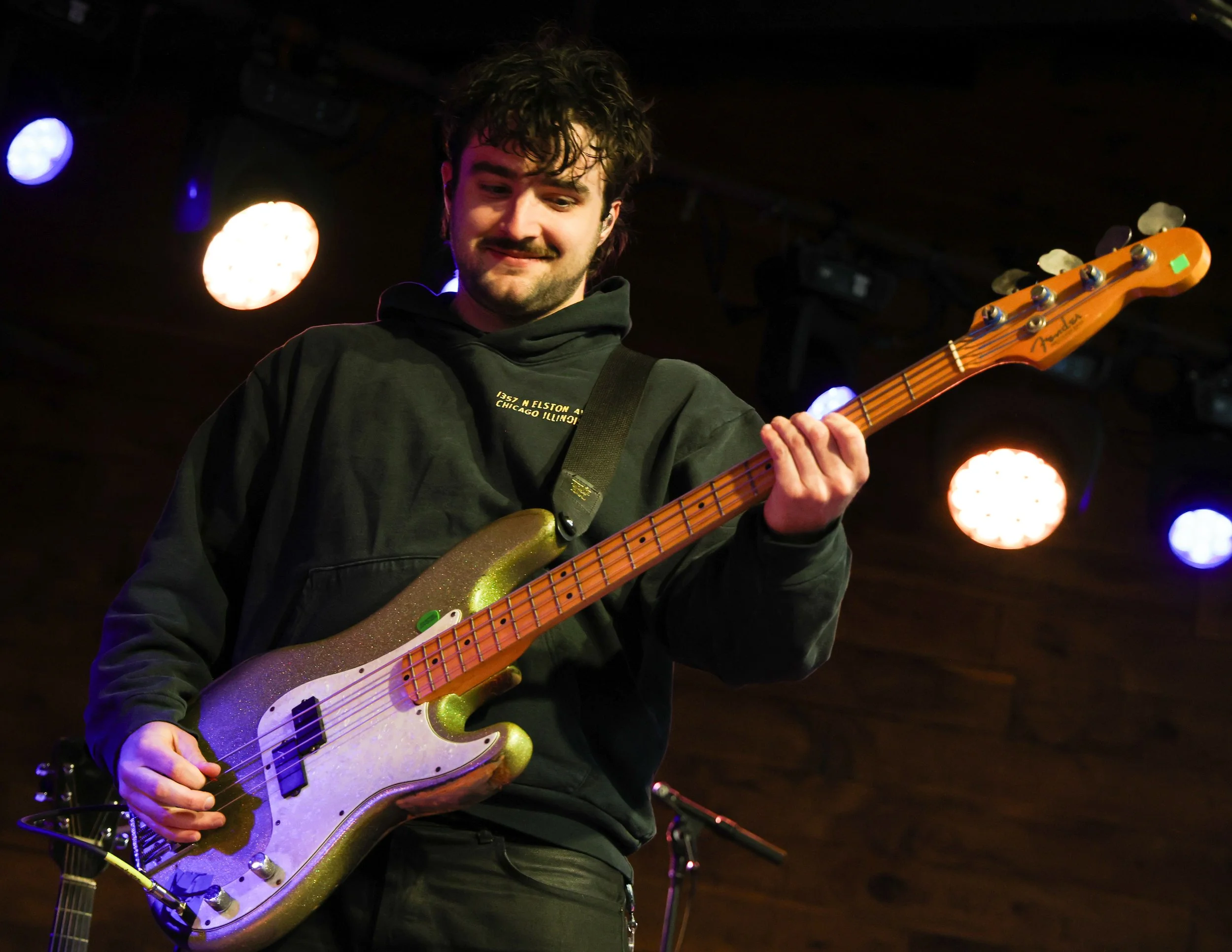  Guitarist Wyatt Moran plays the chords to Ethan Tasch’s song “Holdup” from his debut album  Got Him!  