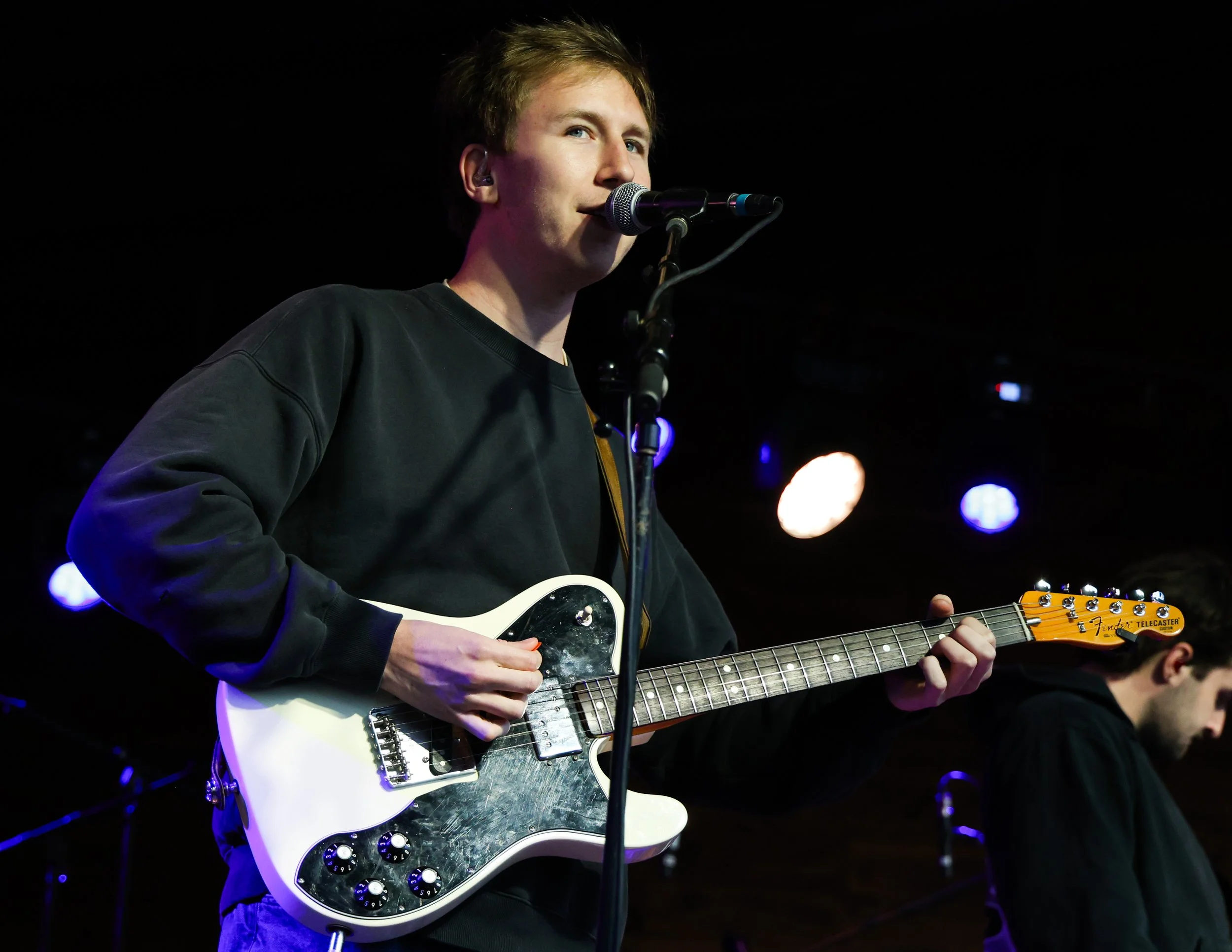  Ethan Tasch sings the lyrics to “He’s getting away”: ”Have you seen this face? Which way / Did he go when he got up and ran? / God, I hope he’s okay these days / Used to know him like the back of my hand.” 