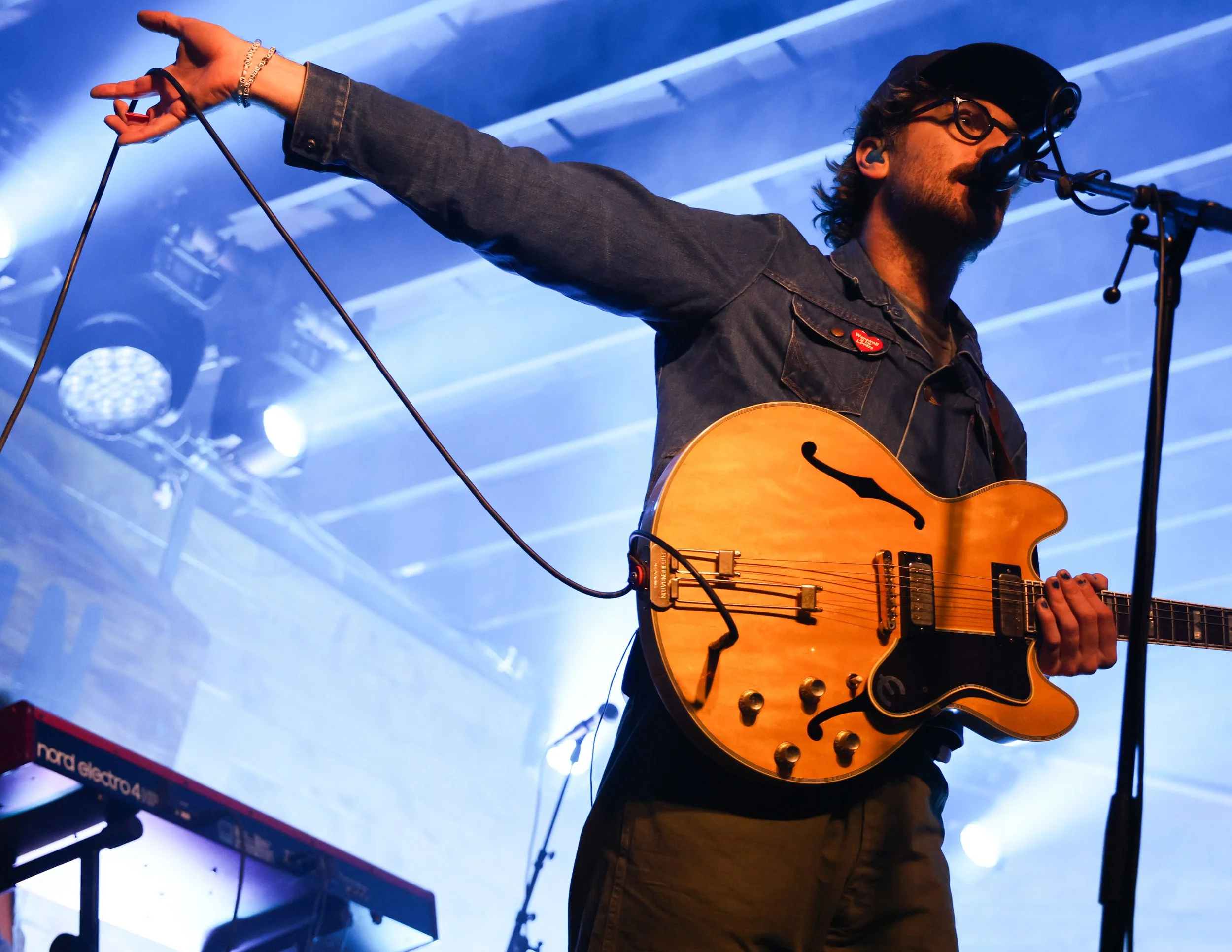  Settine sings the lyrics to “Off the Lawn”: “Oh my God, how I’d fall / Right into your arms / I’m stepping over what went wrong / Three steps and I’m gone.” 