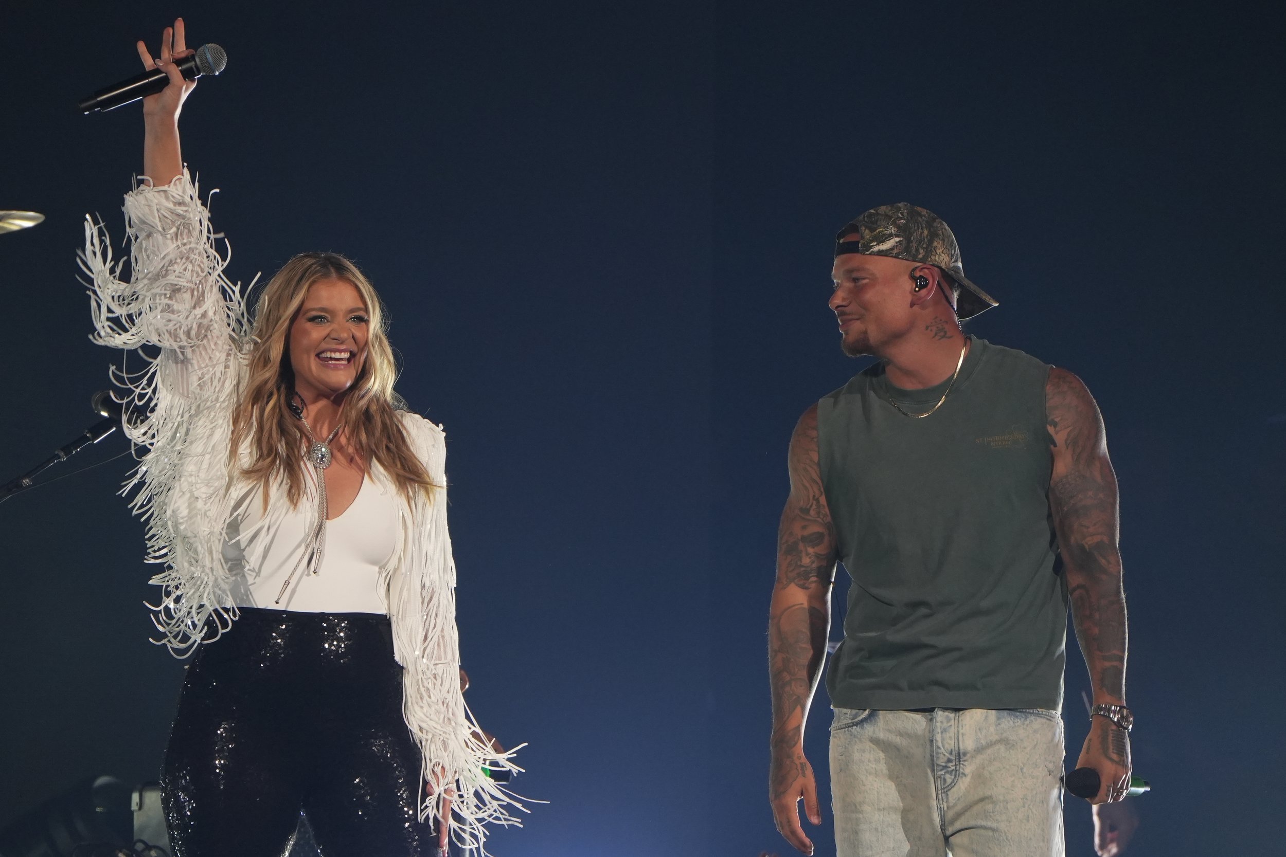  Childhood friends Lauren Alaina and Kane Brown share the stage as they perform their song contrasting fear and faith, “What Ifs.” 