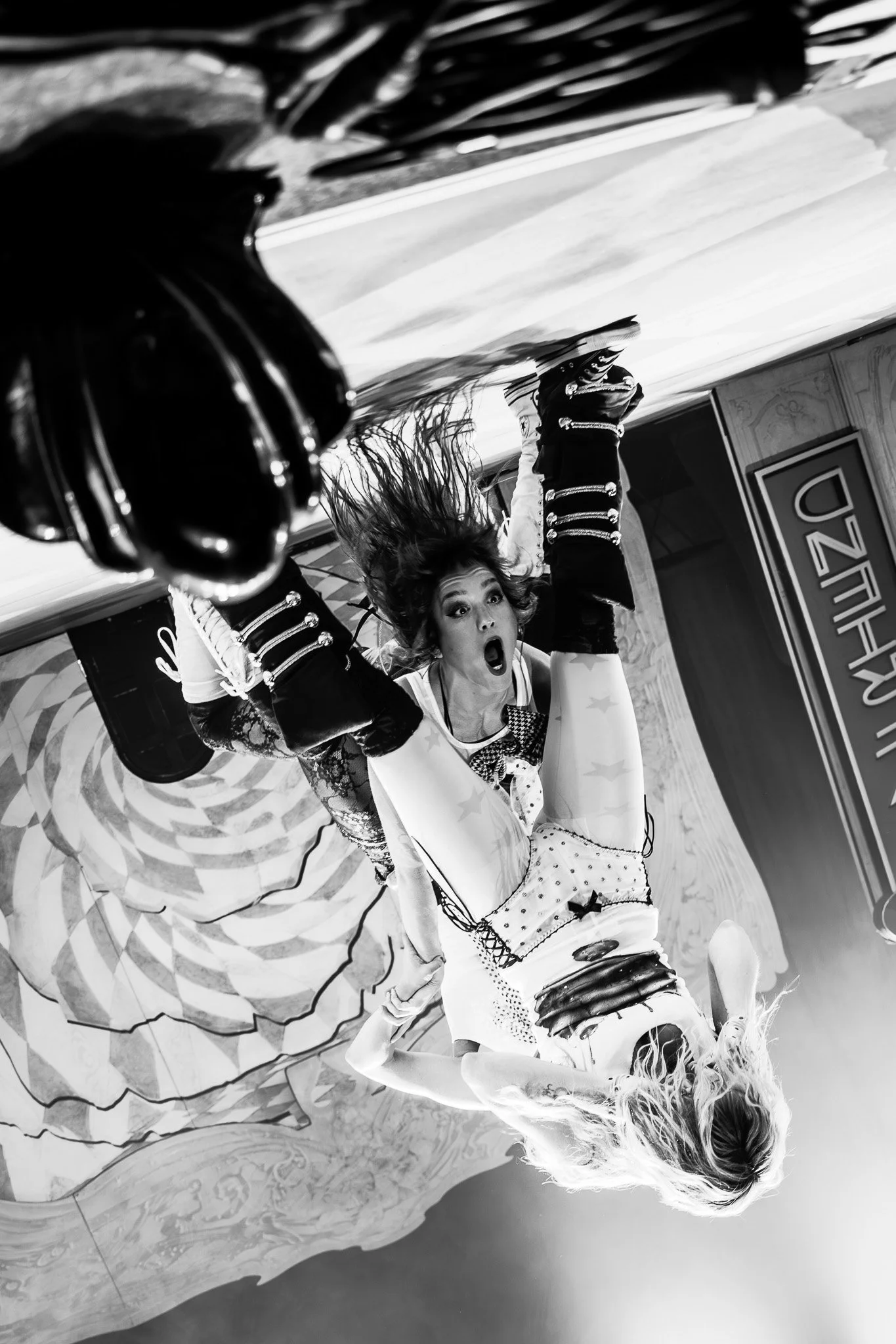  Ashnikko dances as a dancer flips upside down during "Microplastics." 
