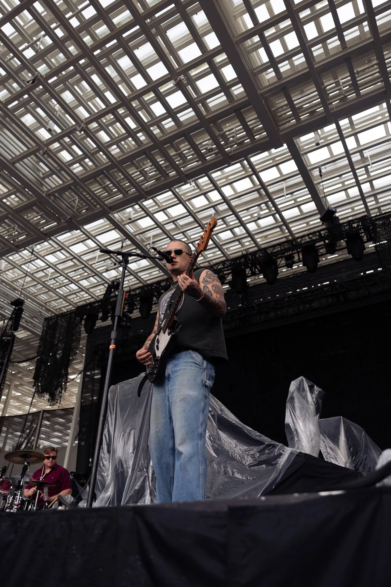  Bassist Reeve Powers keeps the rhythm as Beach Weather performs its song “High In Low Places” from its 2024 album  Melt.  