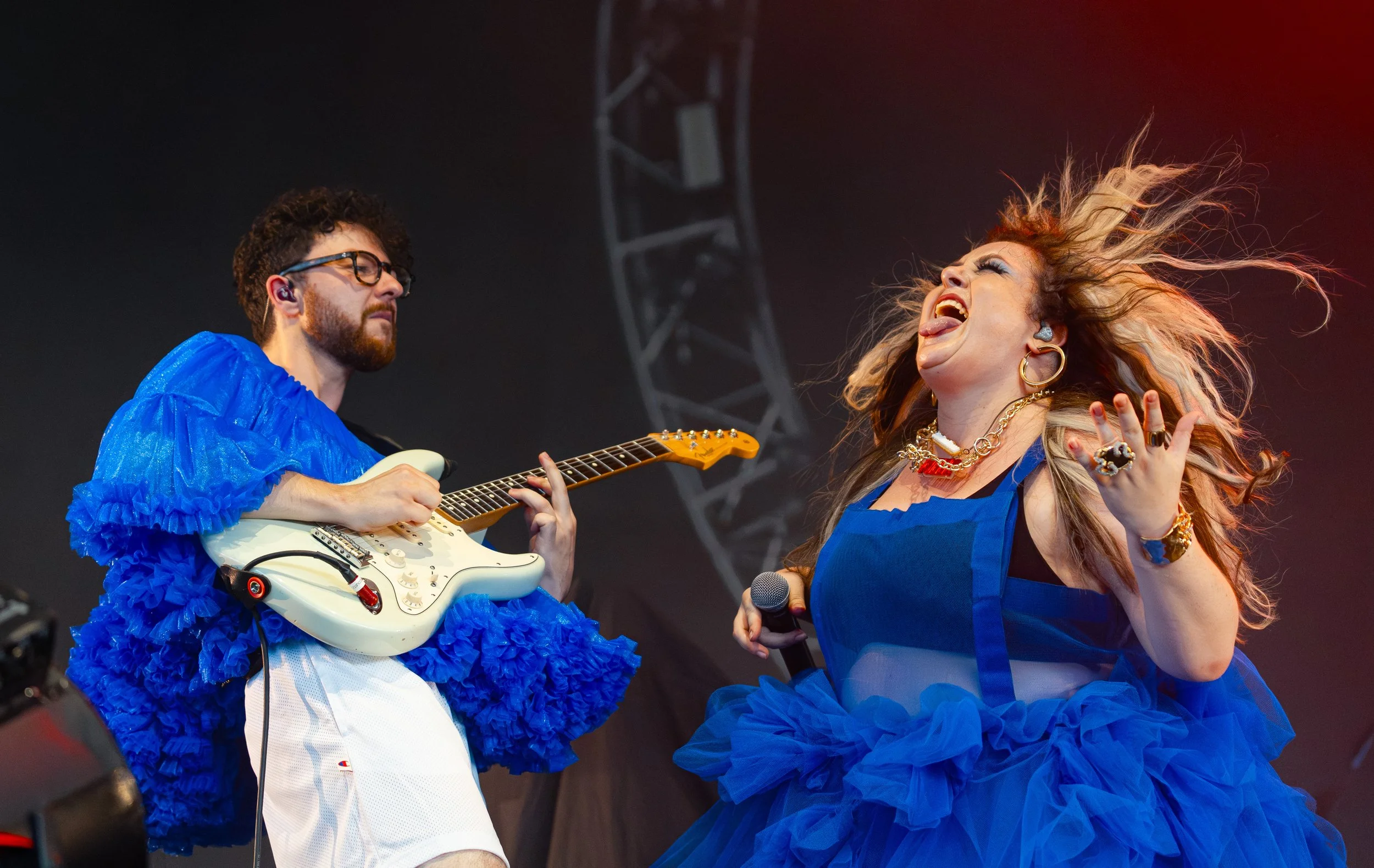  Guitarist Calum Munro shreds while MEEK plays an air guitar during “Even The Rich Die Young.” 