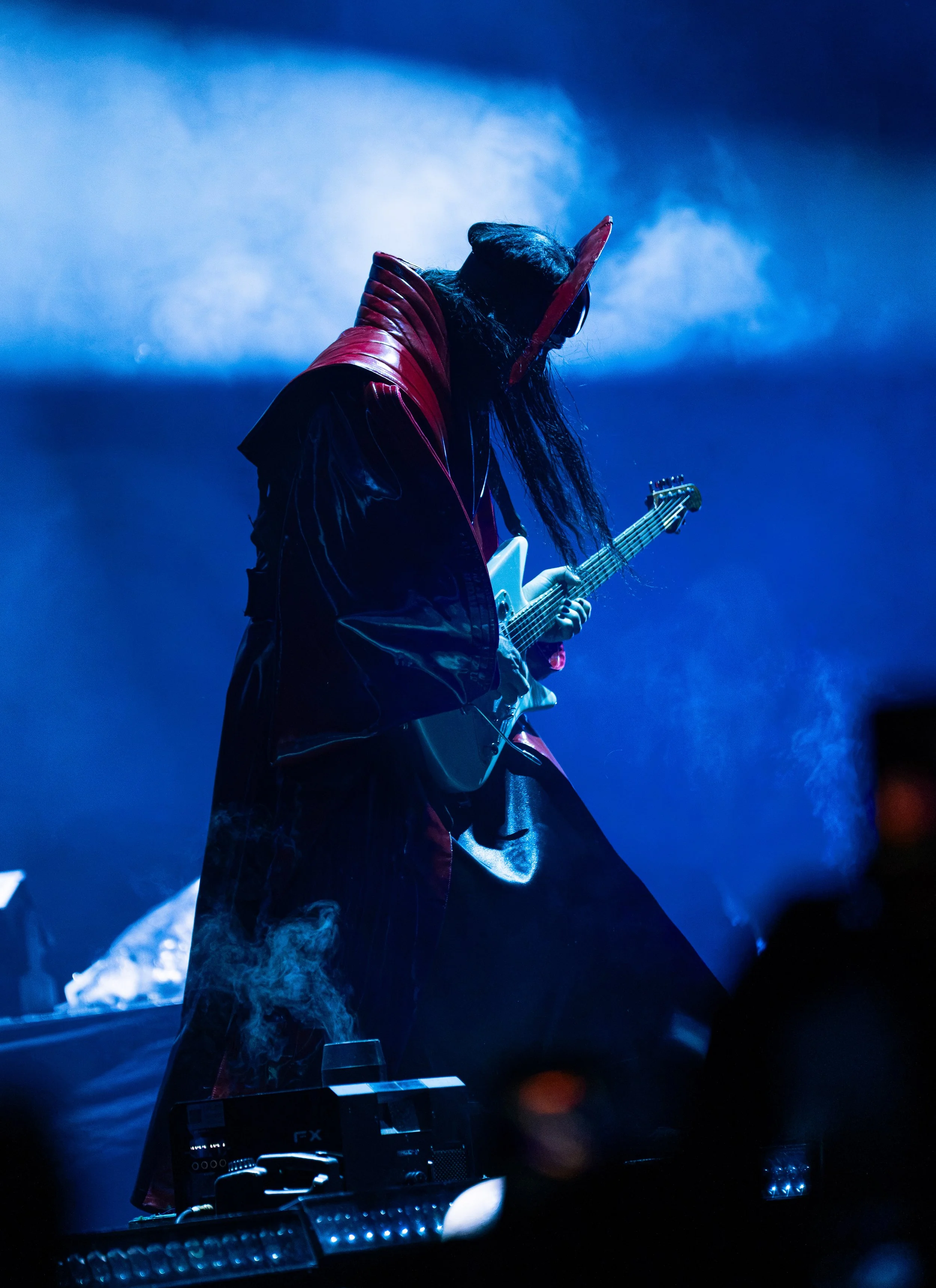  Empire of the Sun frontman Luke Steele rocks out on the guitar during “Changes” from the band’s latest album  Ask That God.  