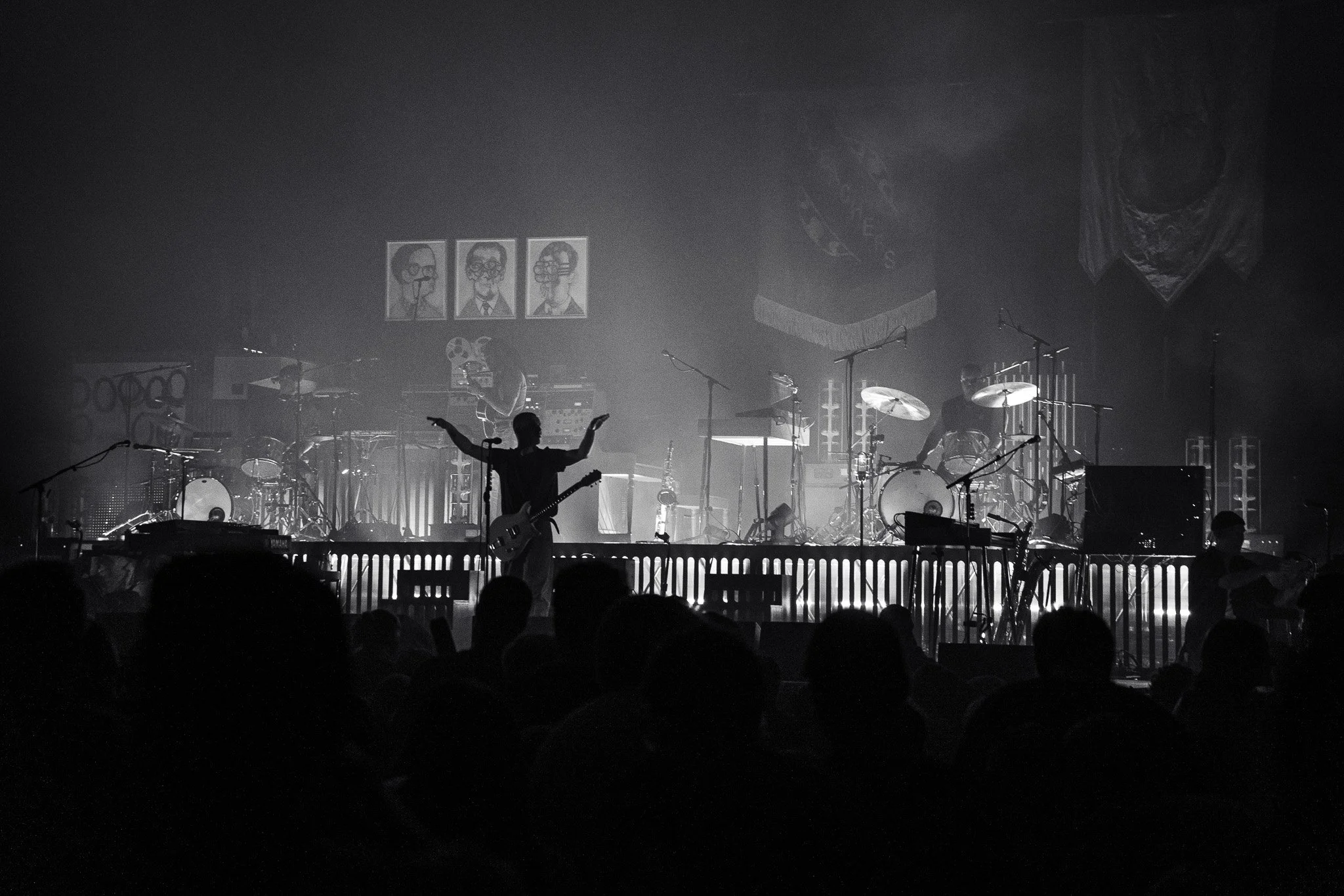  Antonoff raises his arms on stage and tells the crowd to get low for the band’s performance of "Jesus Is Dead." 