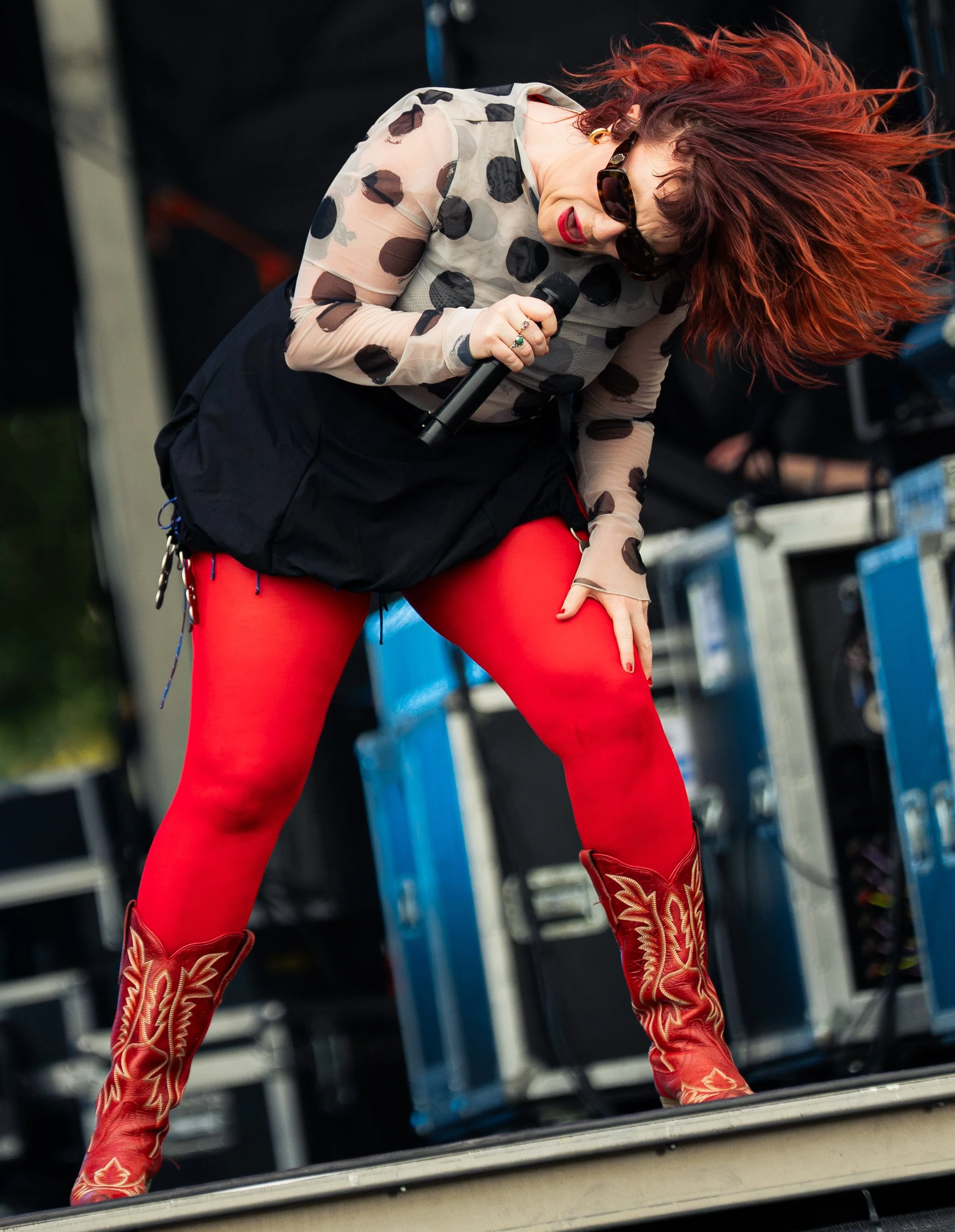  CMAT flips her hair while performing “I Don't Really Care for You.” 