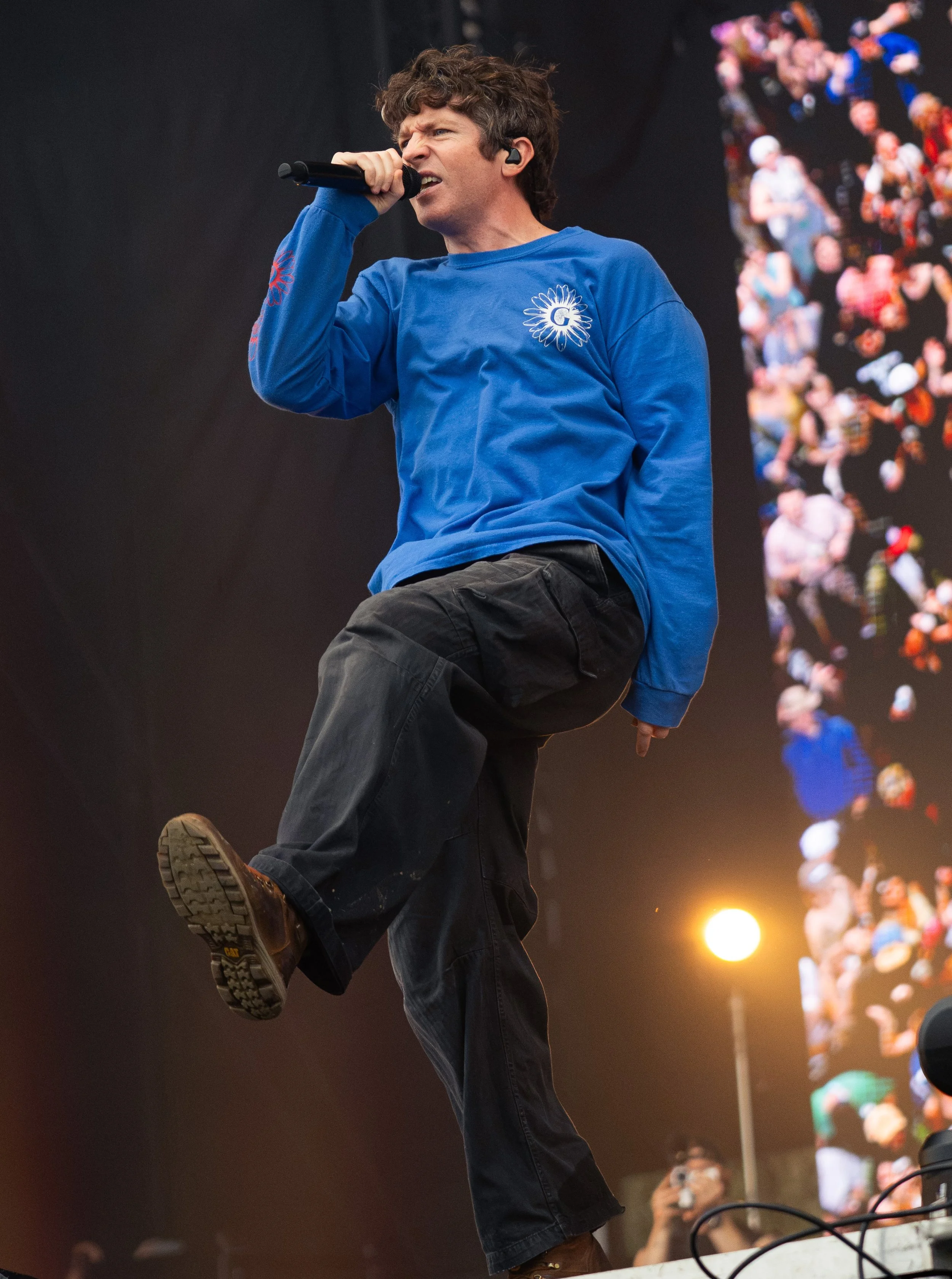  Turnstile’s lead vocalist Brendan Yates jumps around as he performs “BIRDS” from the band’s 2025 album  NEVER ENOUGH.  