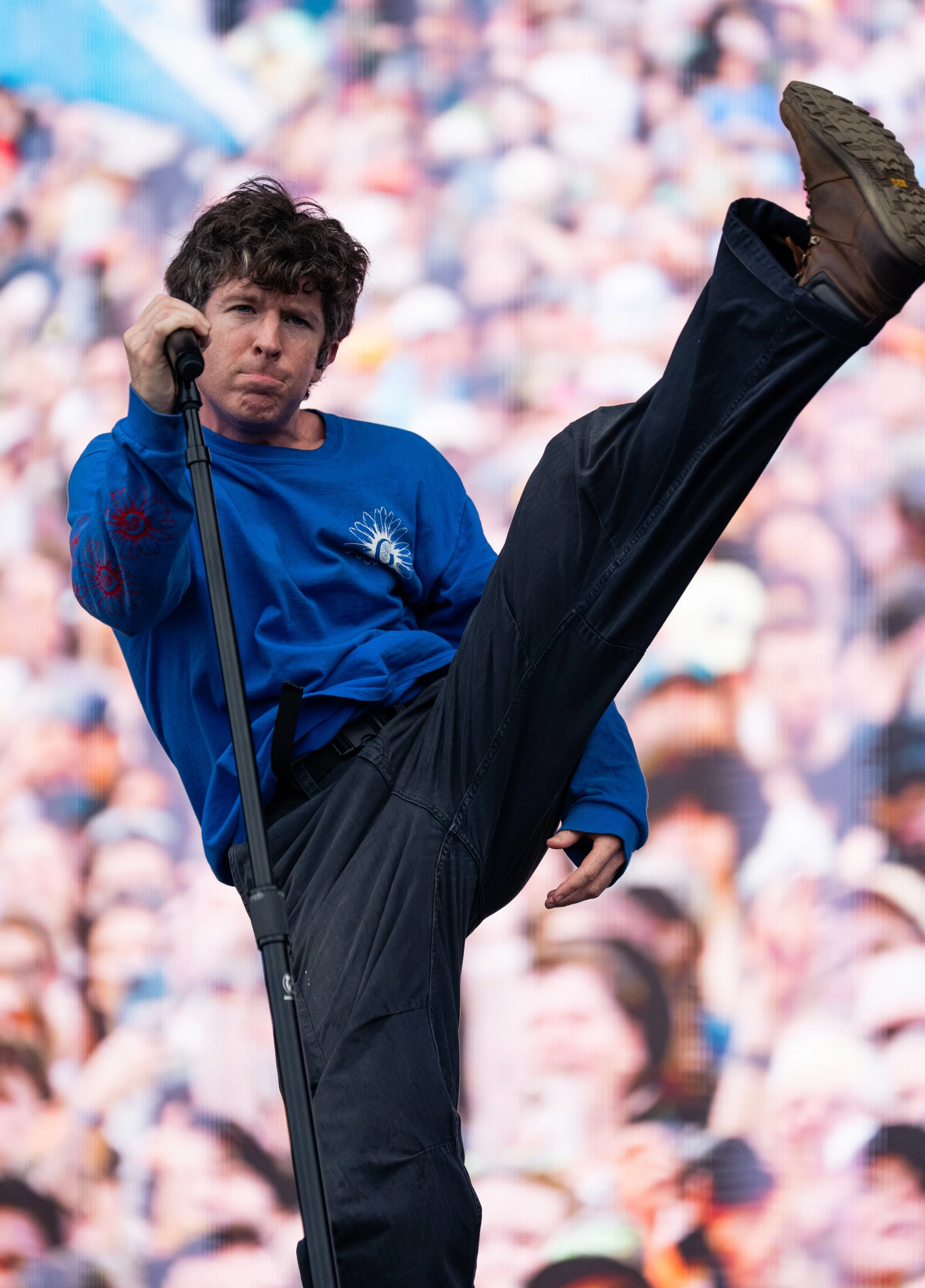  Turnstile’s lead vocalist Brendan Yates jumps around as he performs “BIRDS” from the band’s 2025 album  NEVER ENOUGH.  
