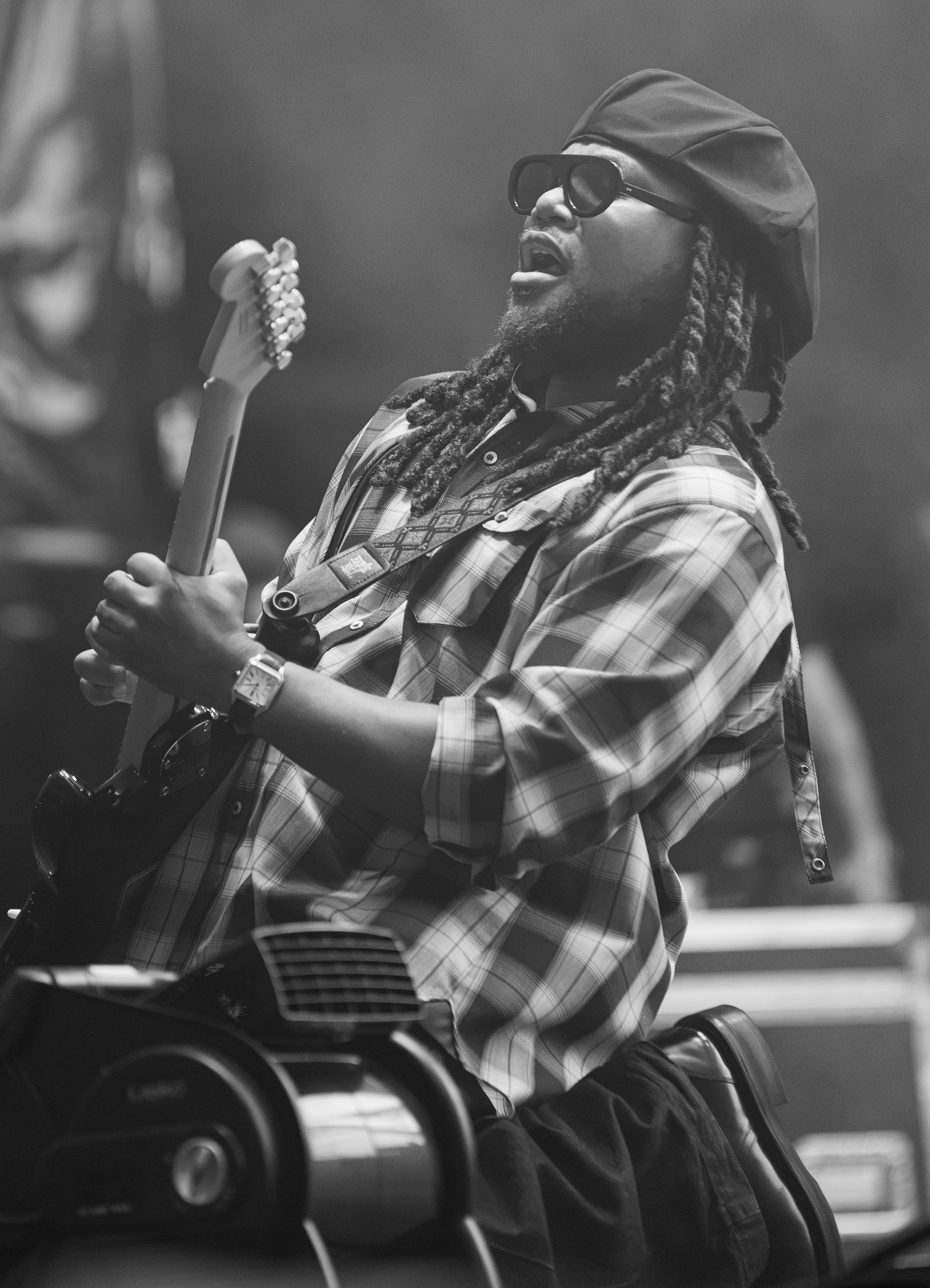  Thomas gets down on his knees to crank out a solo on the guitar while performing “FAR FETCHED.” 