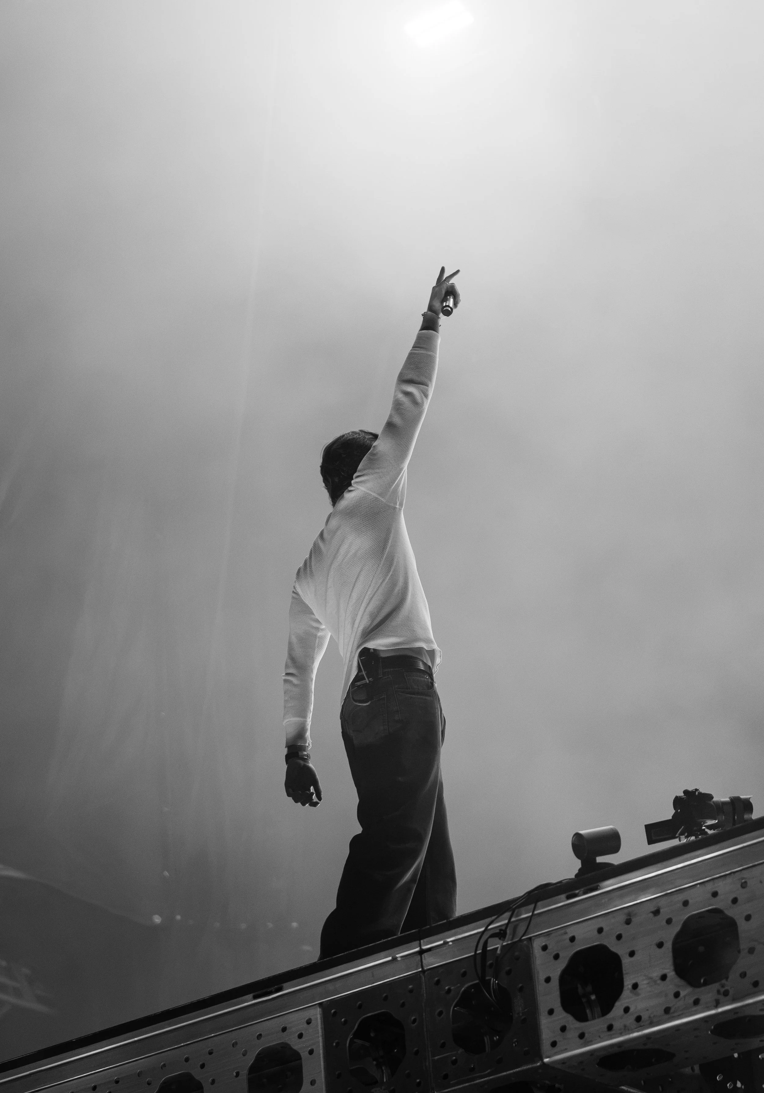  The Chainsmokers frontman Drew Taggart stands on top of the DJ board to take in the crowd singing “Roses.” 
