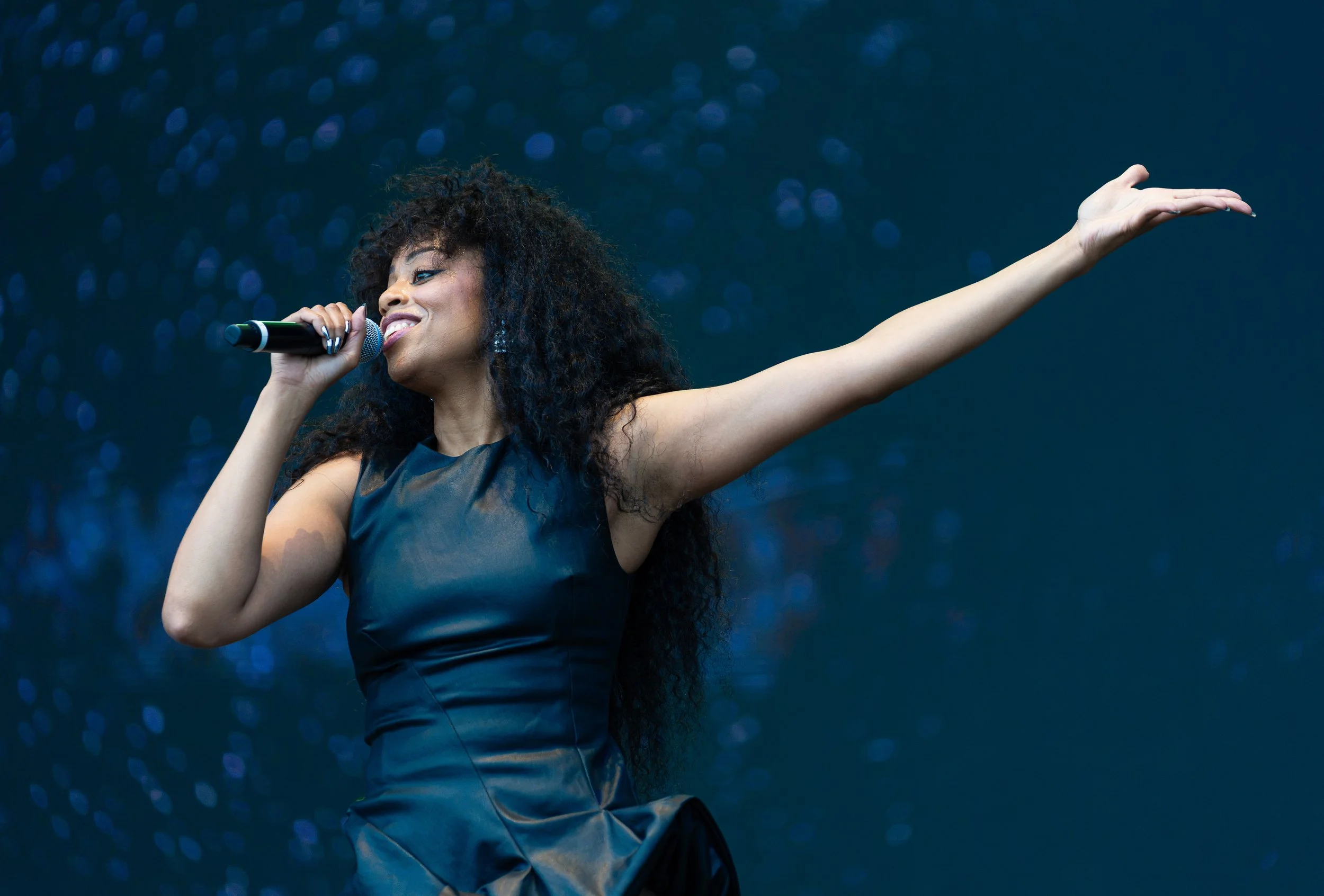  Jordan dances around as she sings the upbeat lyrics of “Close 2 Me”: “It's not fair what you do to me / Make me wanna live in a fantasy / Where we drop everything and leave / Can we just go tonight.” 