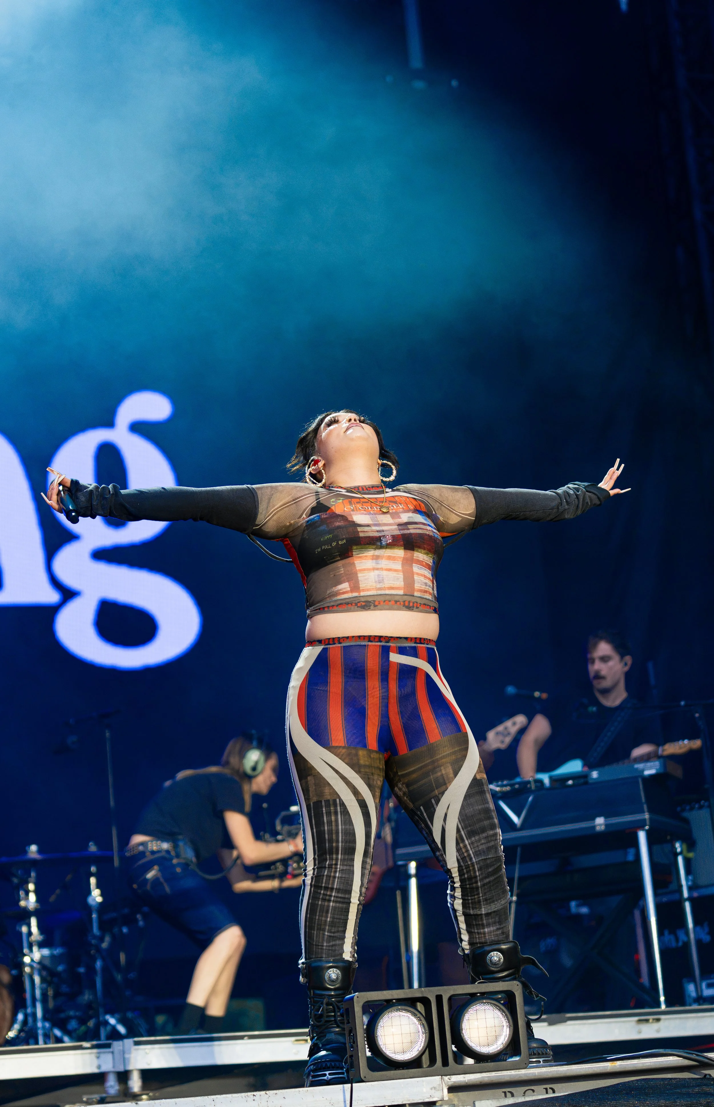  English pop star Lola Young sings hit song “Big Brown Eyes” from her 2024 album  This Wasn’t Meant for You Anyway.  