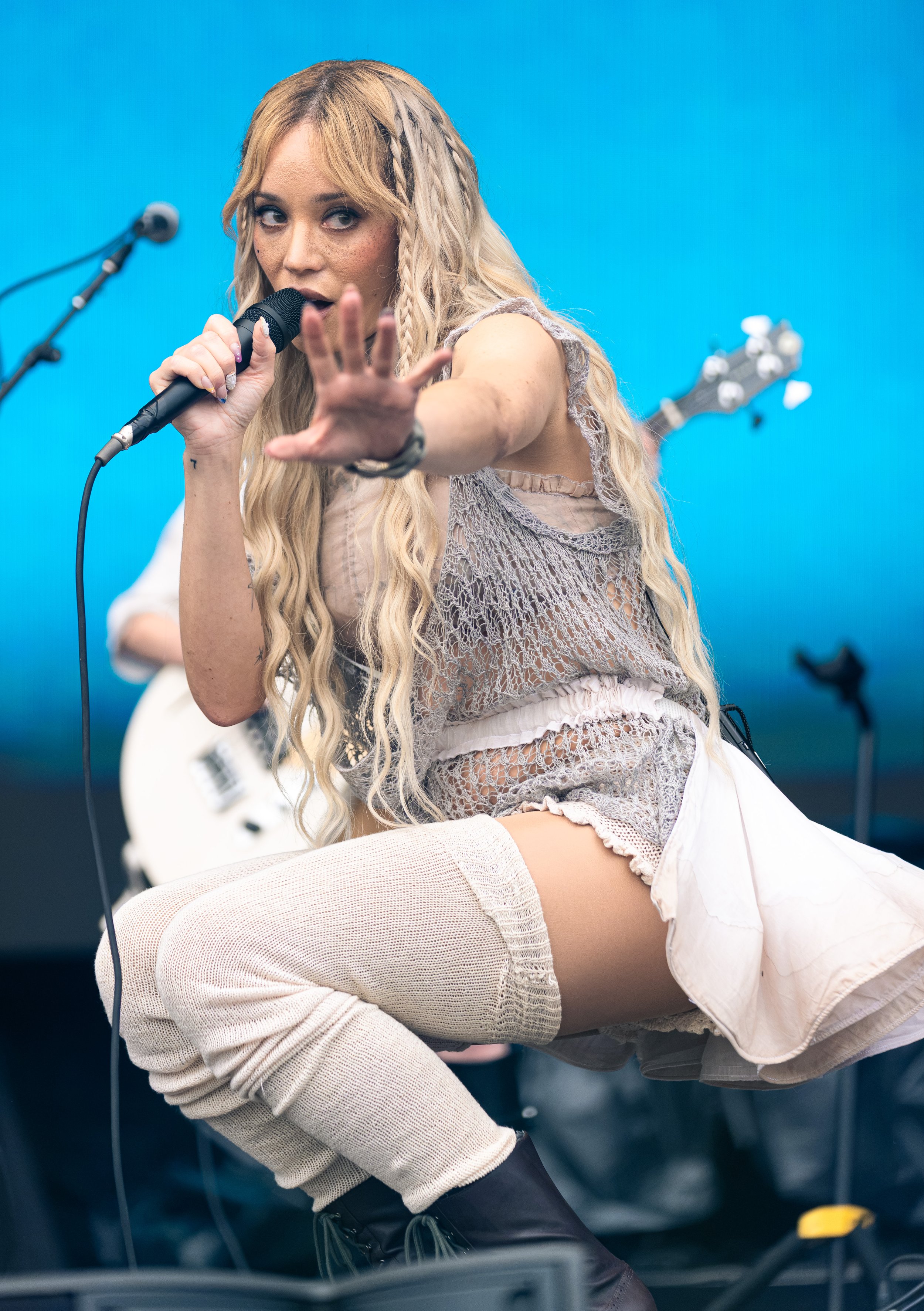  Frontwoman of indie-pop band Cannons Michelle Joy holds up her hands as she sings “Loving You.” 