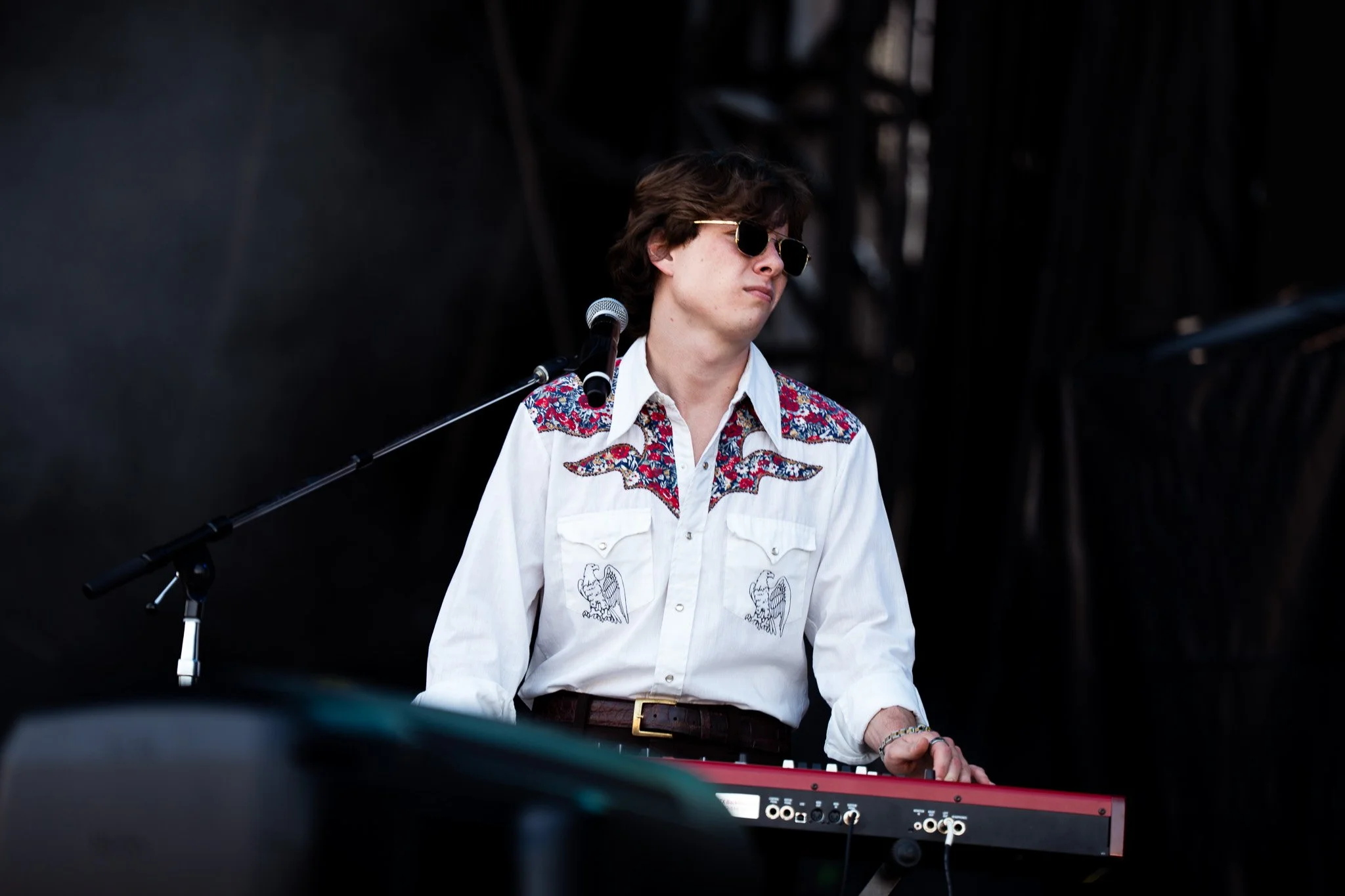 Psychedelic rock band Dallas Wax performs to an energetic crowd at the Snapchat stage. 