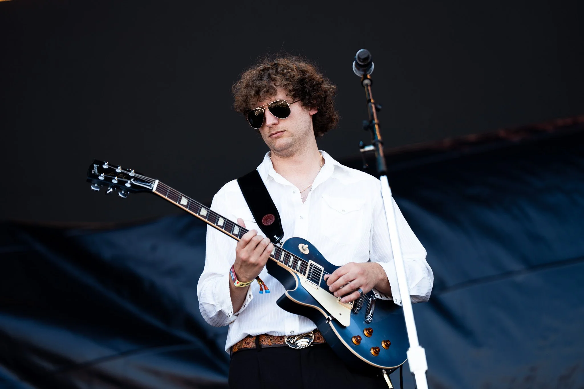  Psychedelic rock band Dallas Wax performs to an energetic crowd at the Snapchat stage. 
