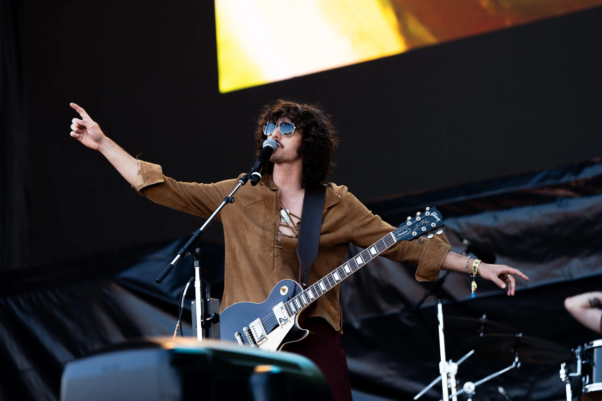  Psychedelic rock band Dallas Wax performs to an energetic crowd at the Snapchat stage. 