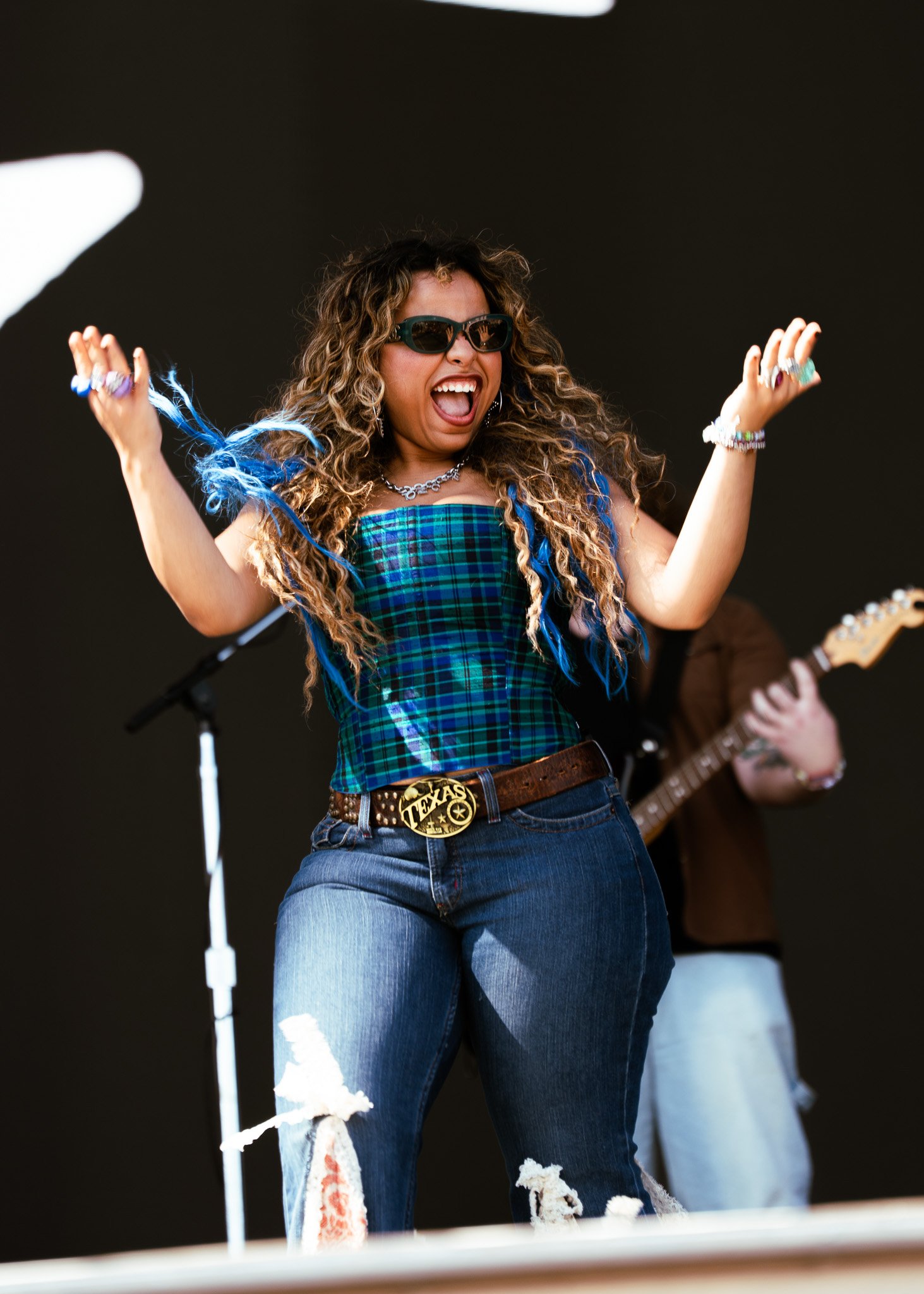  Austin native Bella Kay hypes up the crowd as she walks onto the T-Mobile stage. 