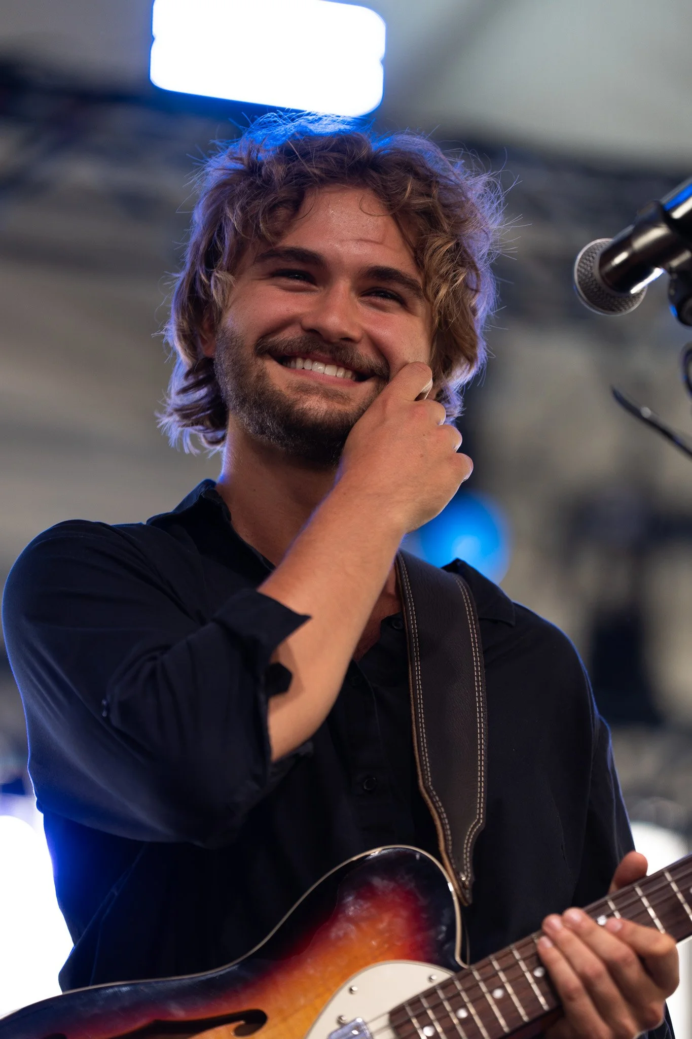  Austin native Bo Staloch grins as he performs “Springtime Red Tulips” and “Your Eyes Tell Stories” on the Tito’s Stage. 