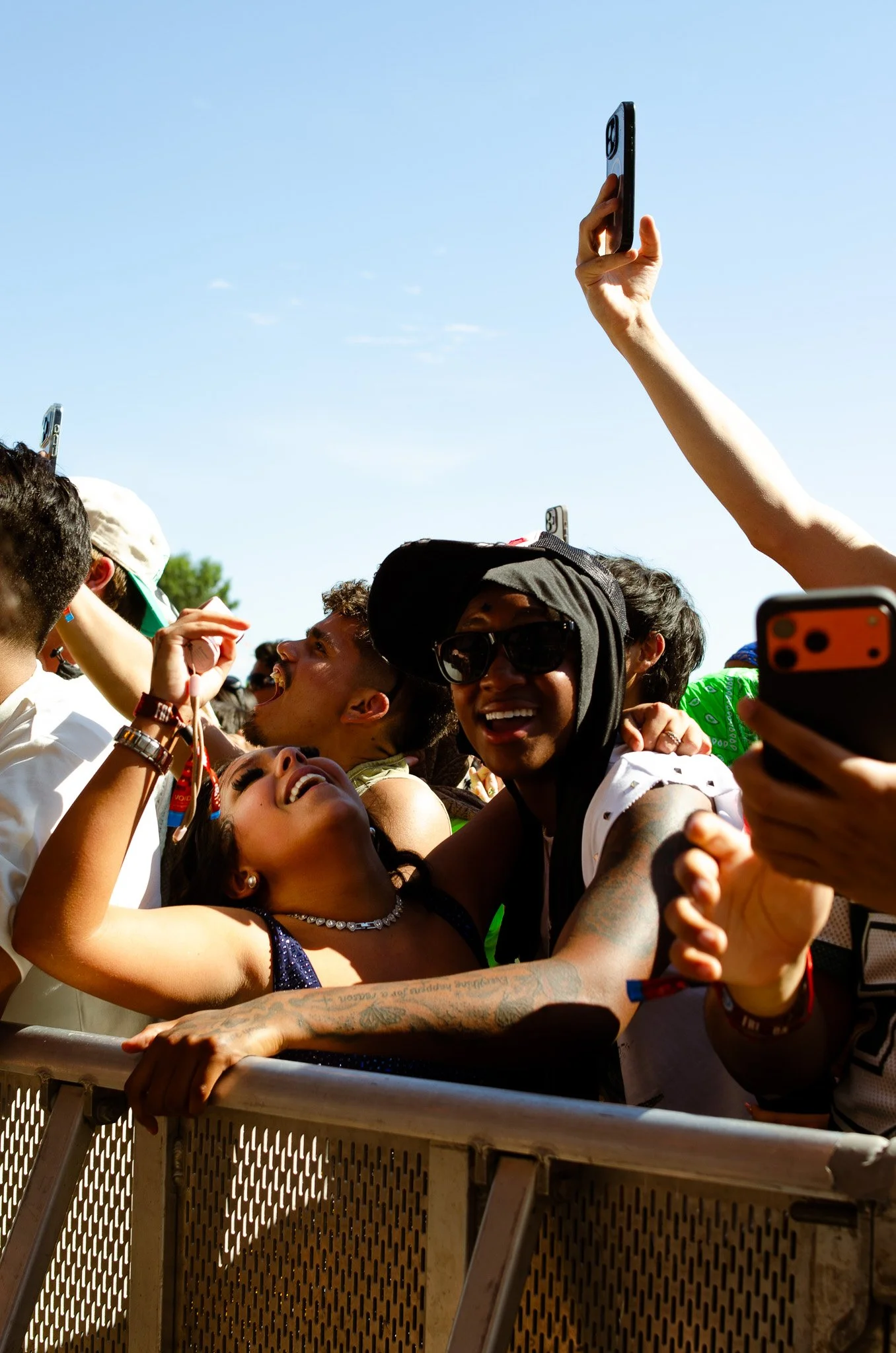  Fans of Sienna Spiro embrace each other during “Material Lover.” 