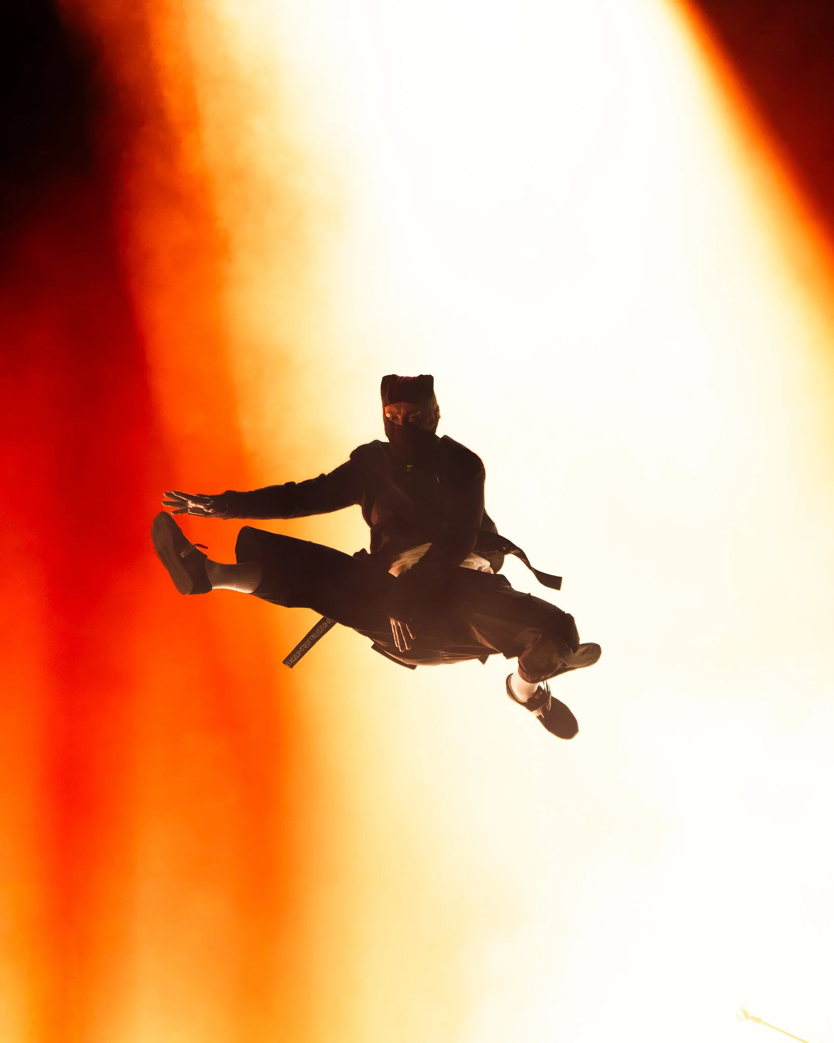  During the beginning of “Overcompensate,” Tyler Joseph of Twenty One Pilots, enters the stage by jumping through white fog. 