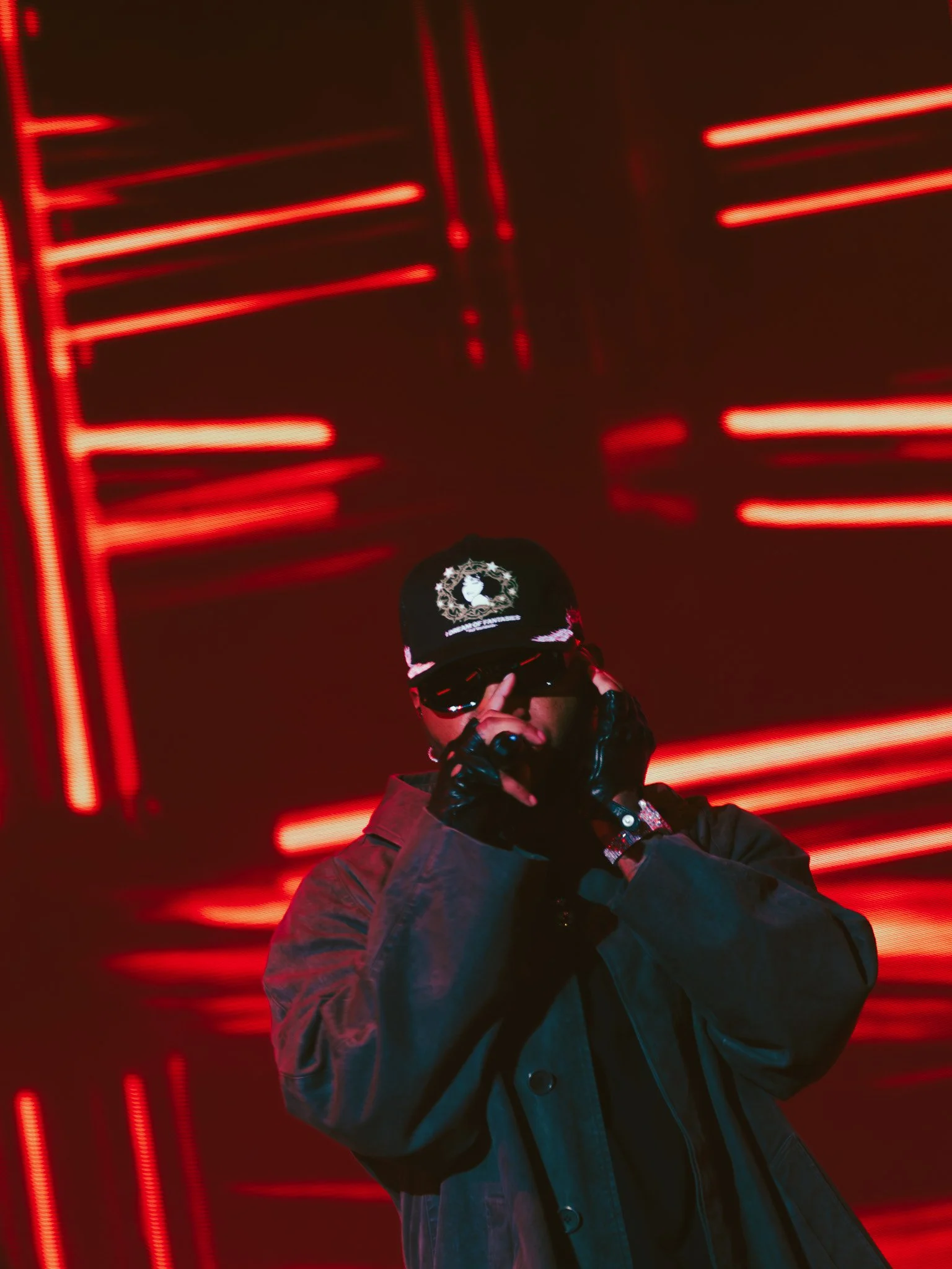  Tiller sings into the microphone during “For However Long” from his 2015 album  TRAPSOUL.  