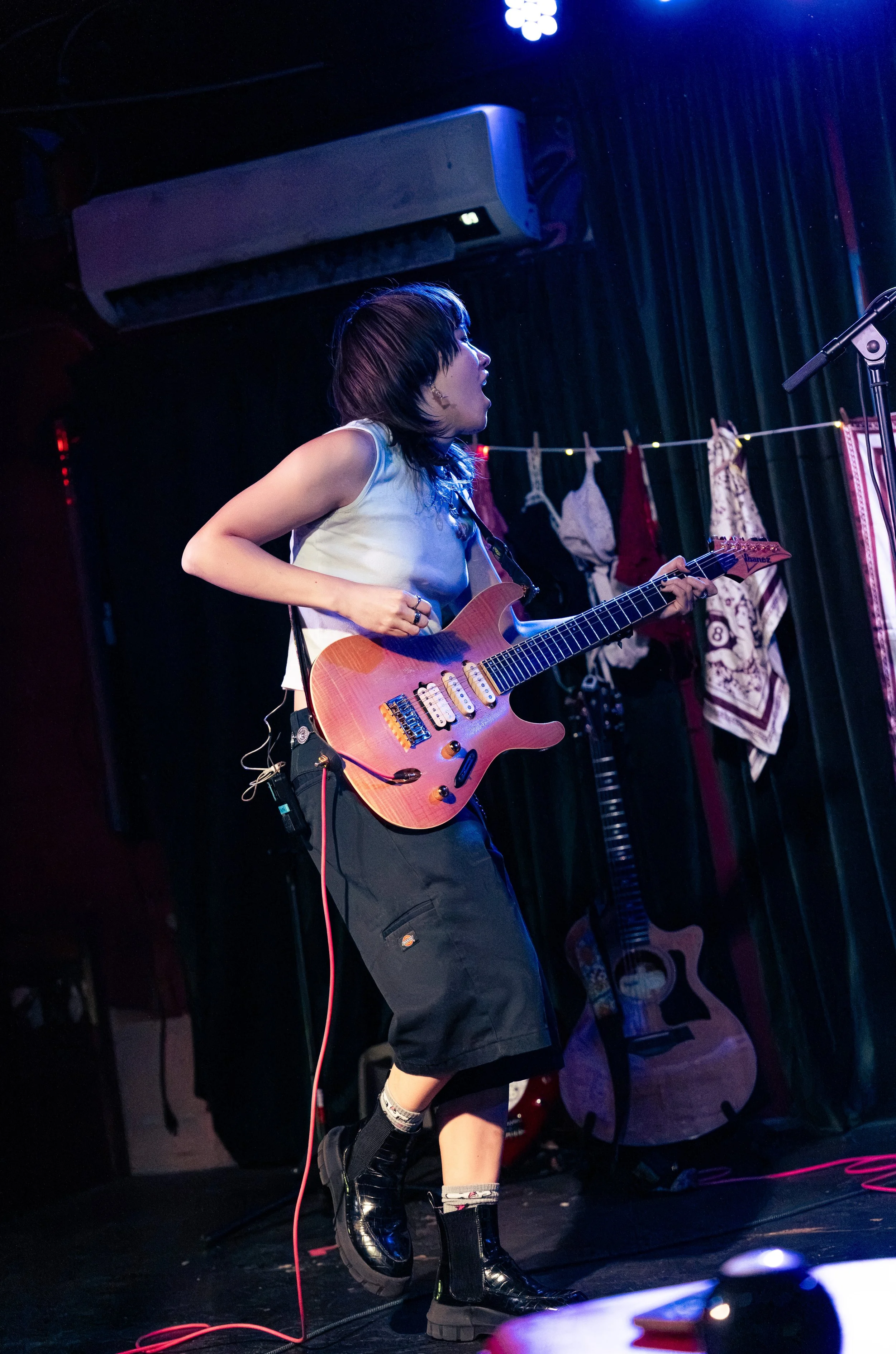  Guitarist Rianna Kopcho enters the stage before starting the night with “By The Roxy.” 