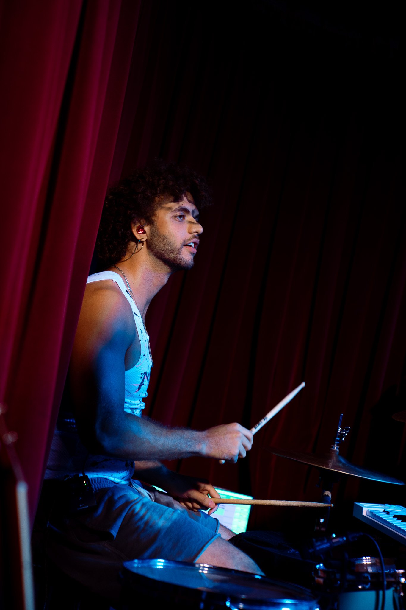  Drummer Julian Lewis rhythmically plays “Body Is On Fire.” 
