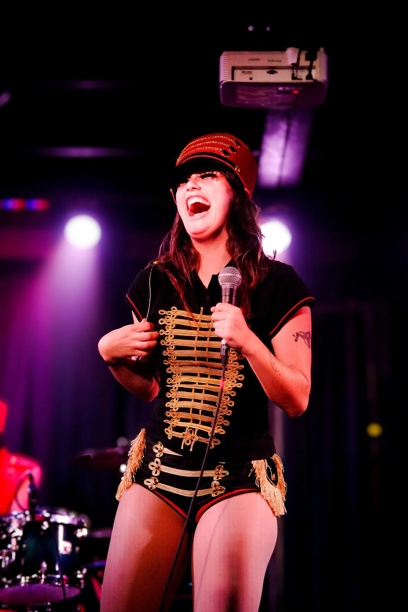  Lemons laughs with her audience after a microphone malfunction. 