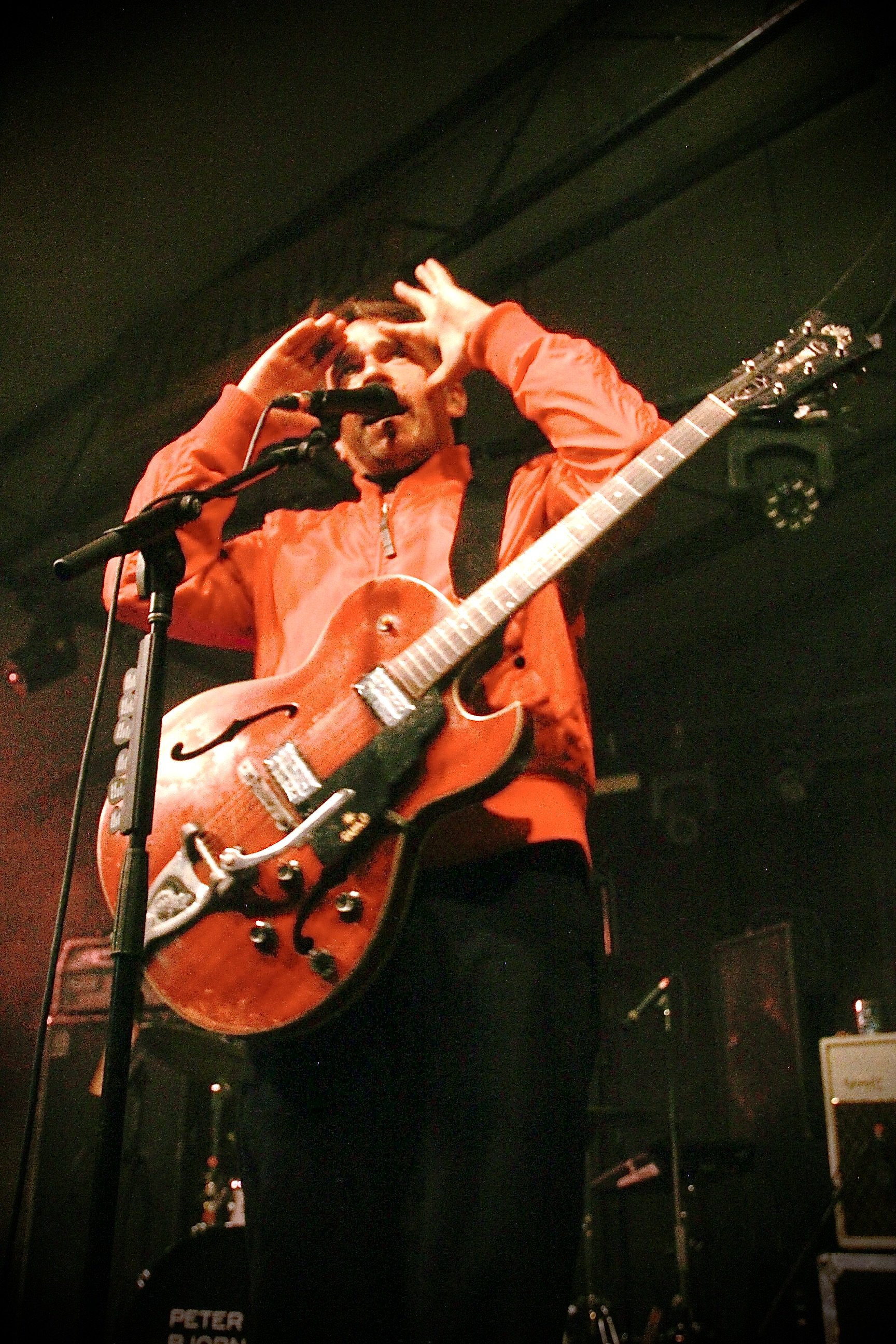  Morén shades his eyes from the light on stage to give a warm welcome to the crowd at Mohawk. 