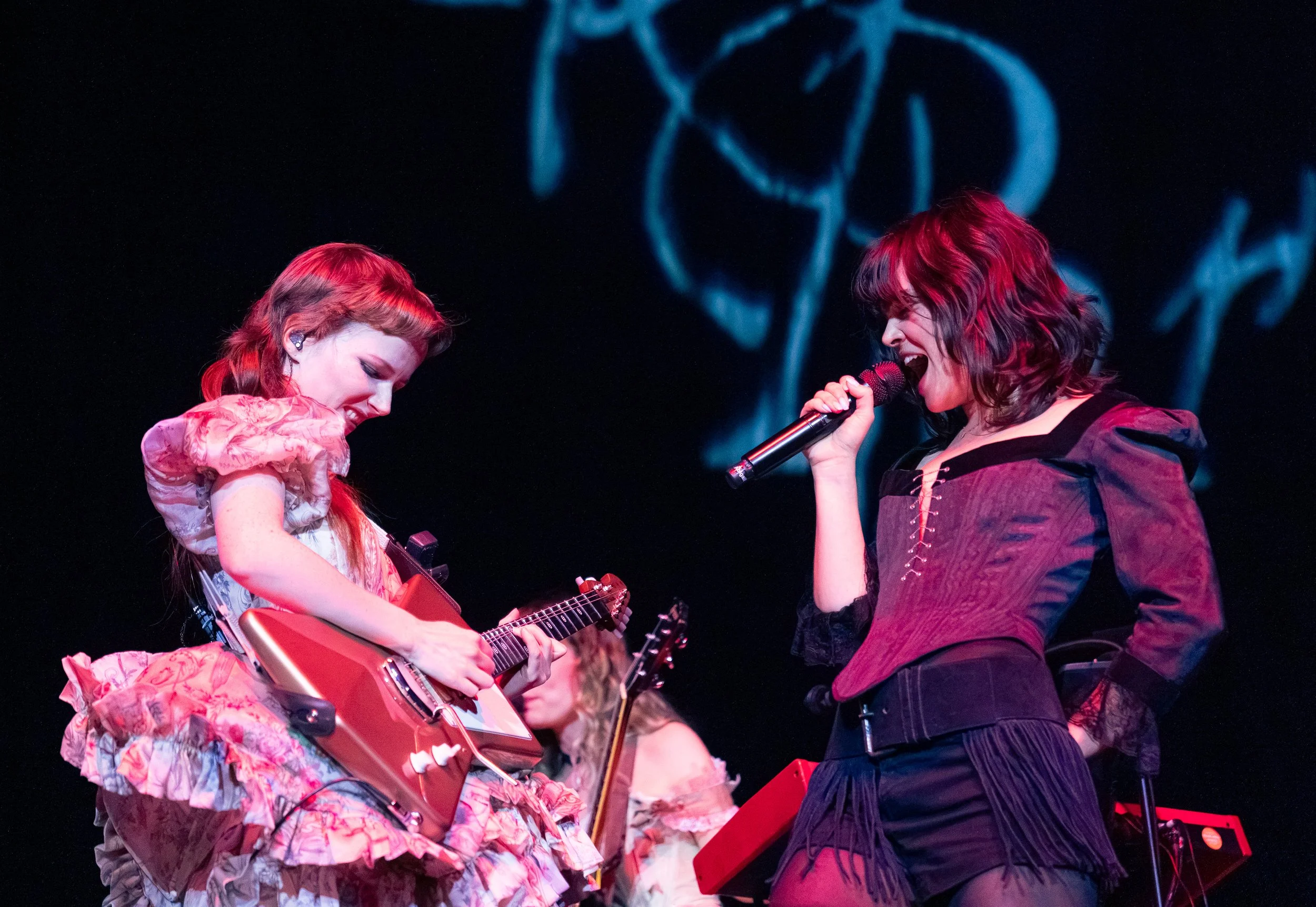 Morris and guitarist Emily Roberts rock out at the end of “Burn Alive.” 
