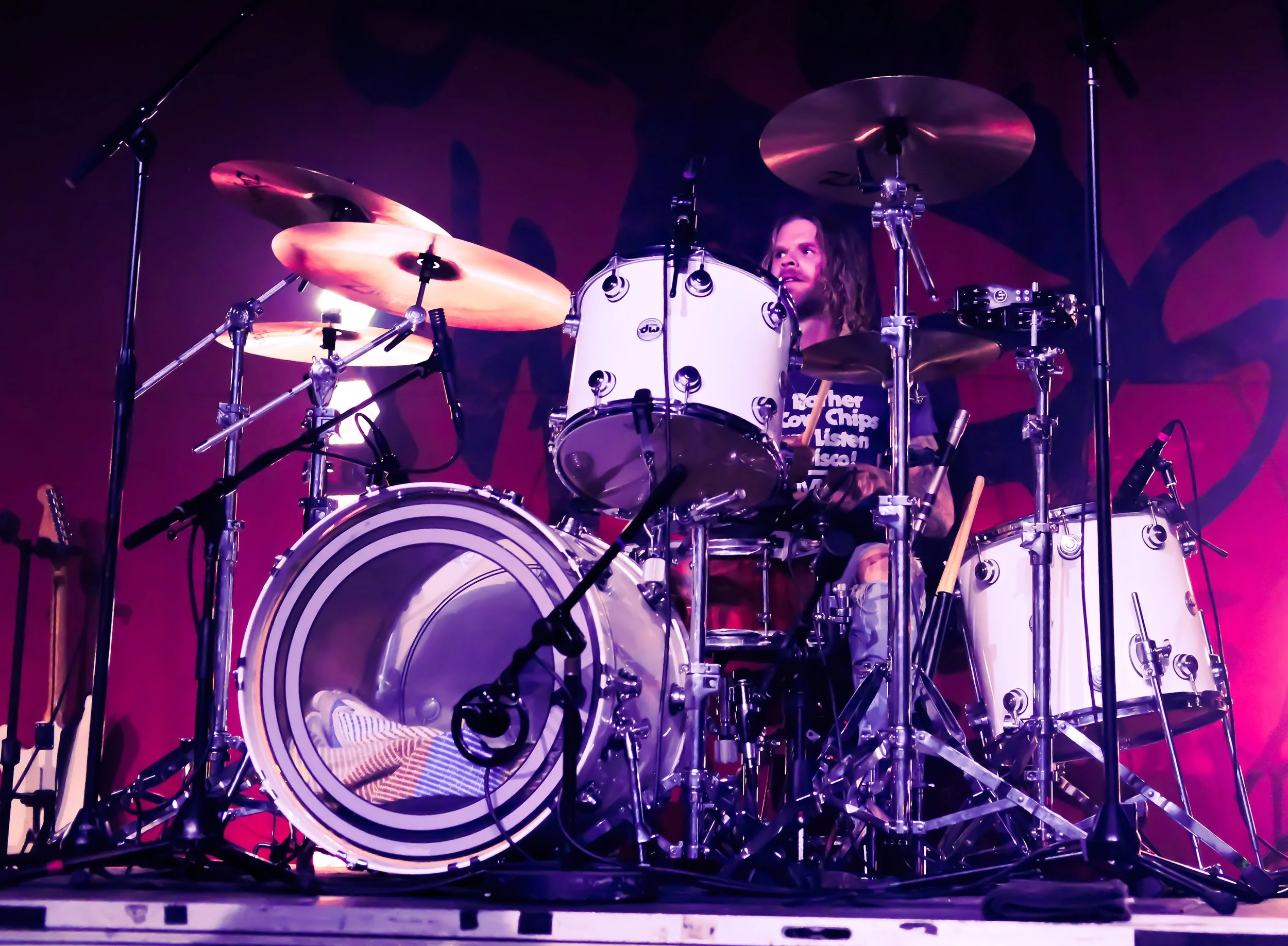 During “Bittersweet,” David Grayson looks out at fans while playing the drums. 