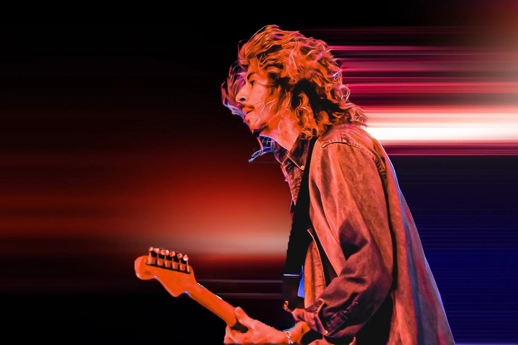  Contreras strums his guitar and flips his hair around as he energetically performs the upbeat song “Heaven.” 