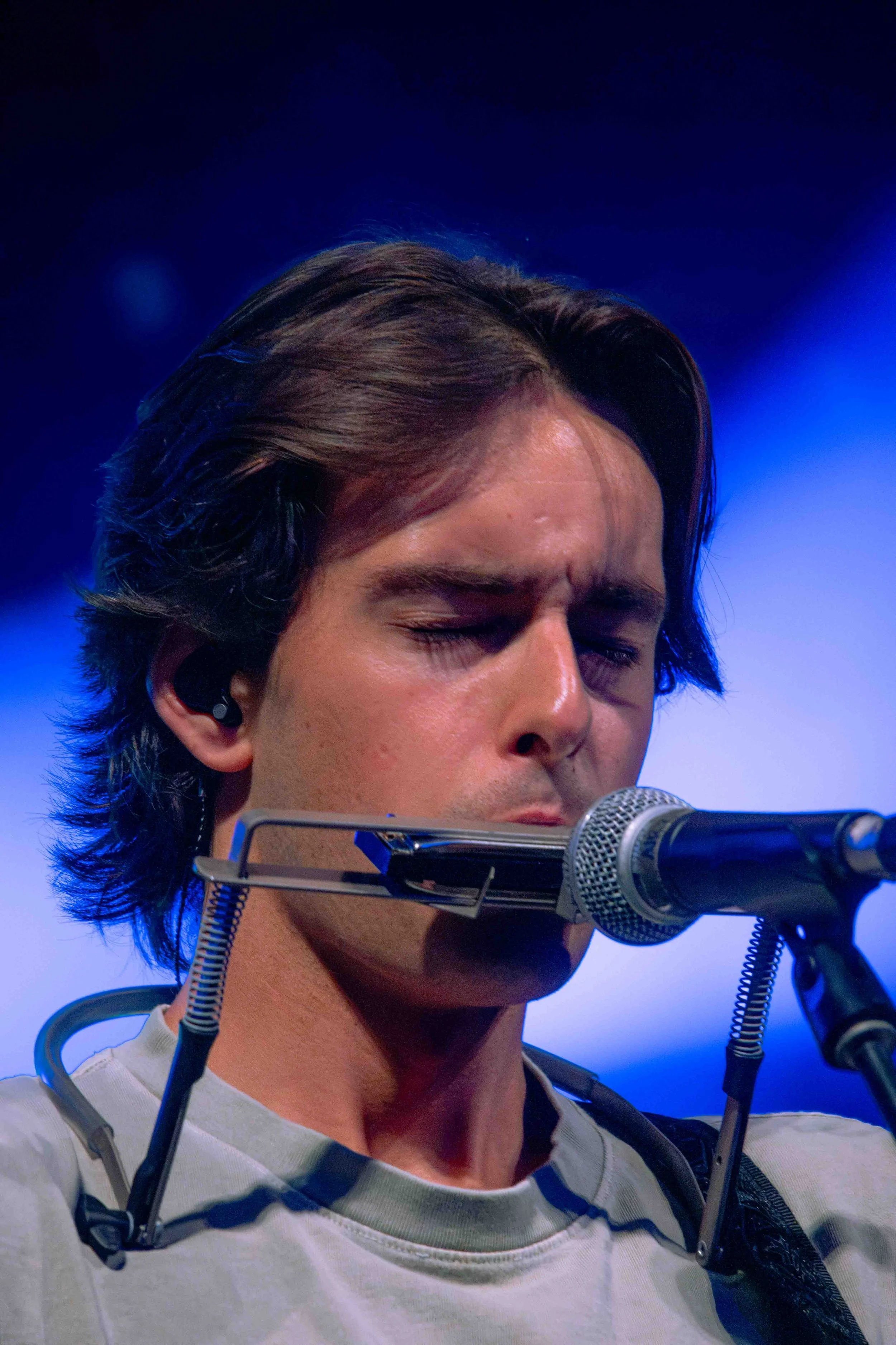  Rinker plays the harmonica during “Red Bandana.” 