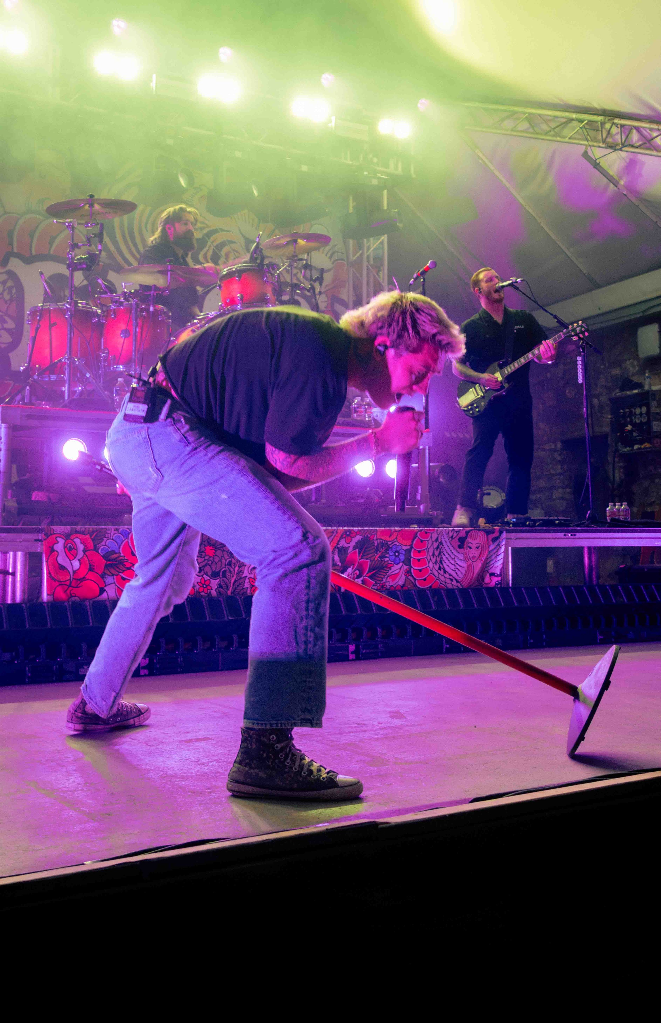  Whitcomb dances across the stage while jamming out to rock influenced song “Pretty Little.” 