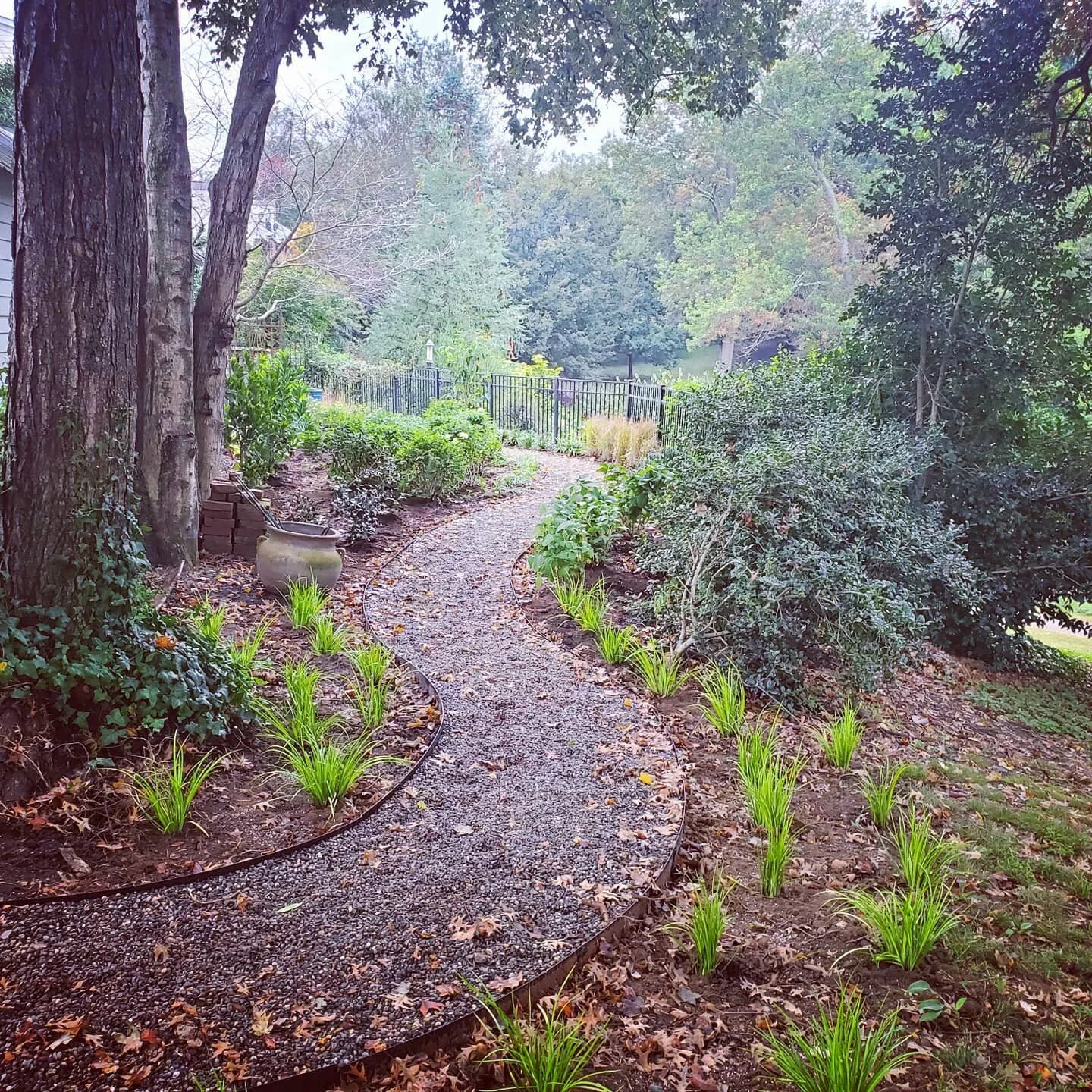 Pearmable pathway that leads to the epic views of Fred Fletcher Park. Flagstone patio which includes mortared joints and custom pavers and native plantings! All overlooking greenway access.  #greenspacesinurbanplaces #flagatonepatio #pearmeable #meta