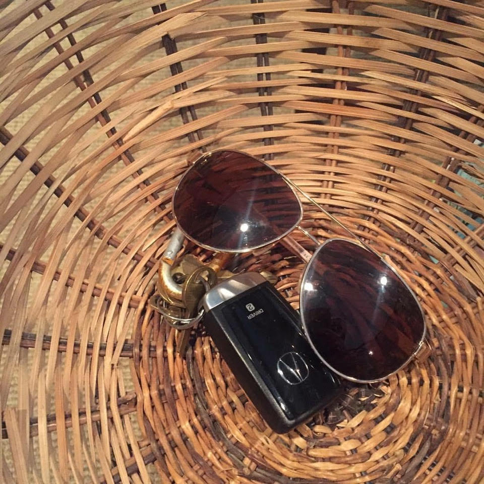 Designate a trendy basket for items like keys, sunglasses, or wallets.  