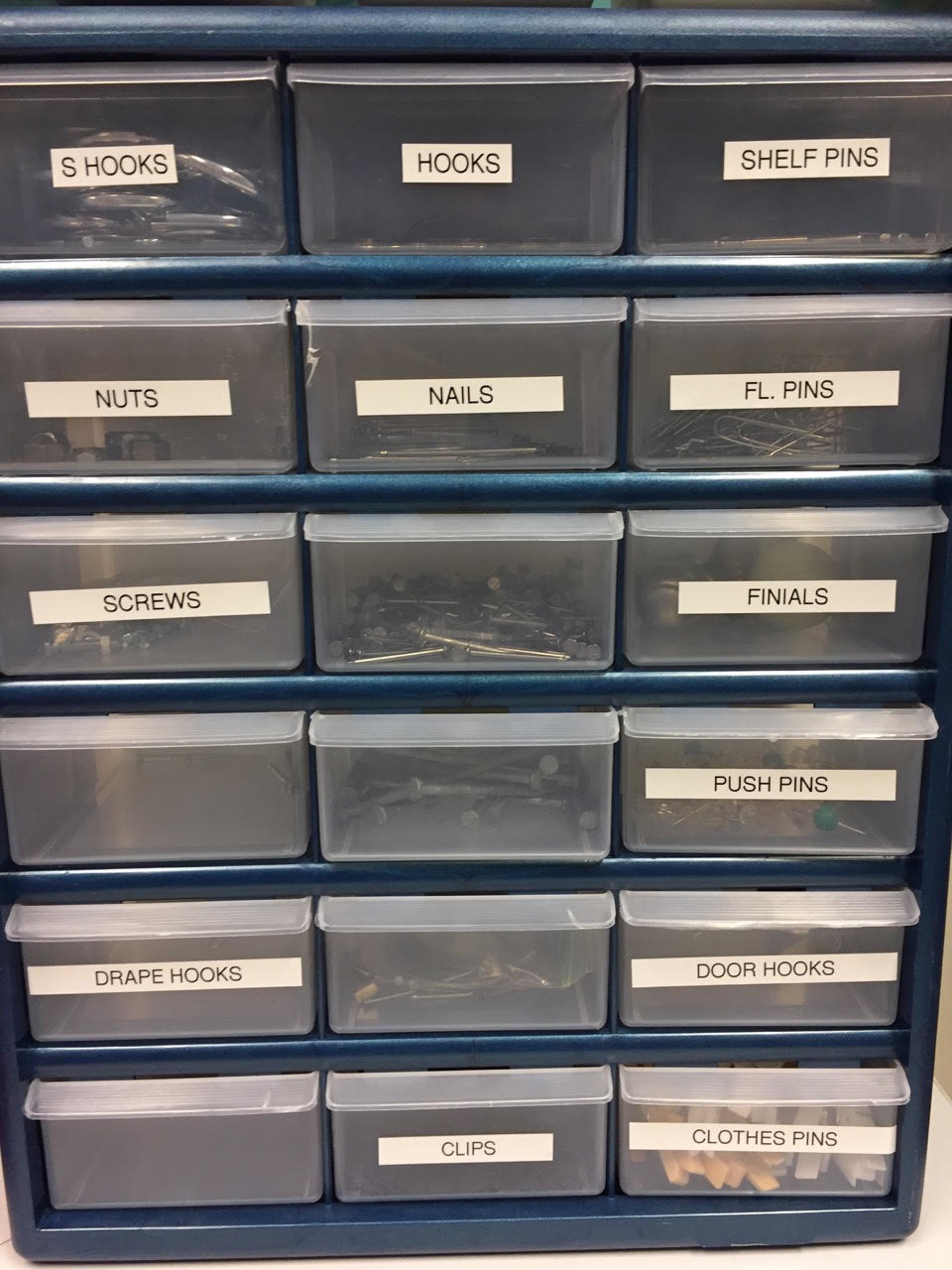 Even hardware has a place! Get a storage unit like this and label all the drawers. 