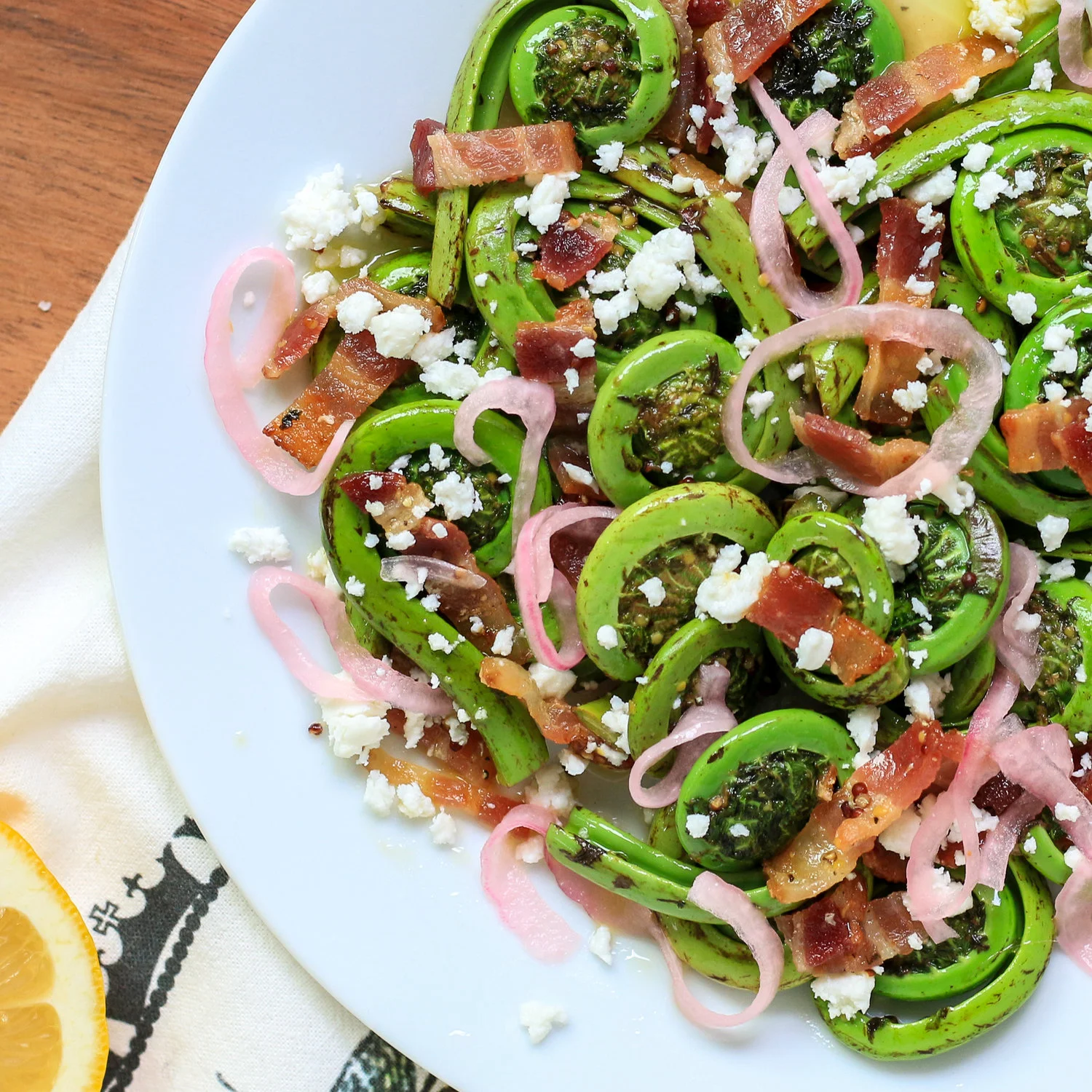 Warm Fiddlehead Salad with Pickled Red Onions, Bacon & Feta